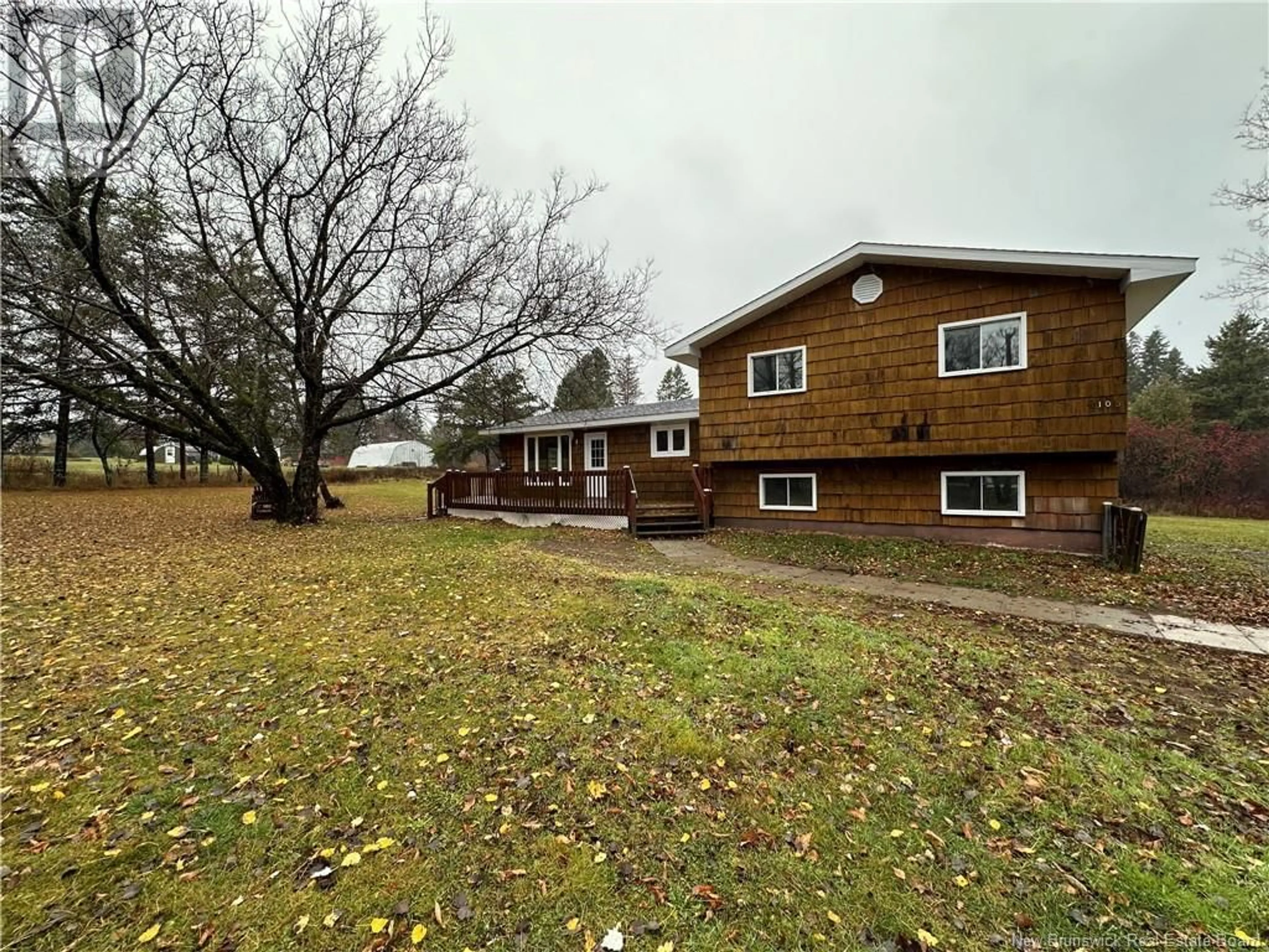 Frontside or backside of a home, the front or back of building for 106 Jacquet River Drive, Belledune New Brunswick E8G2E7