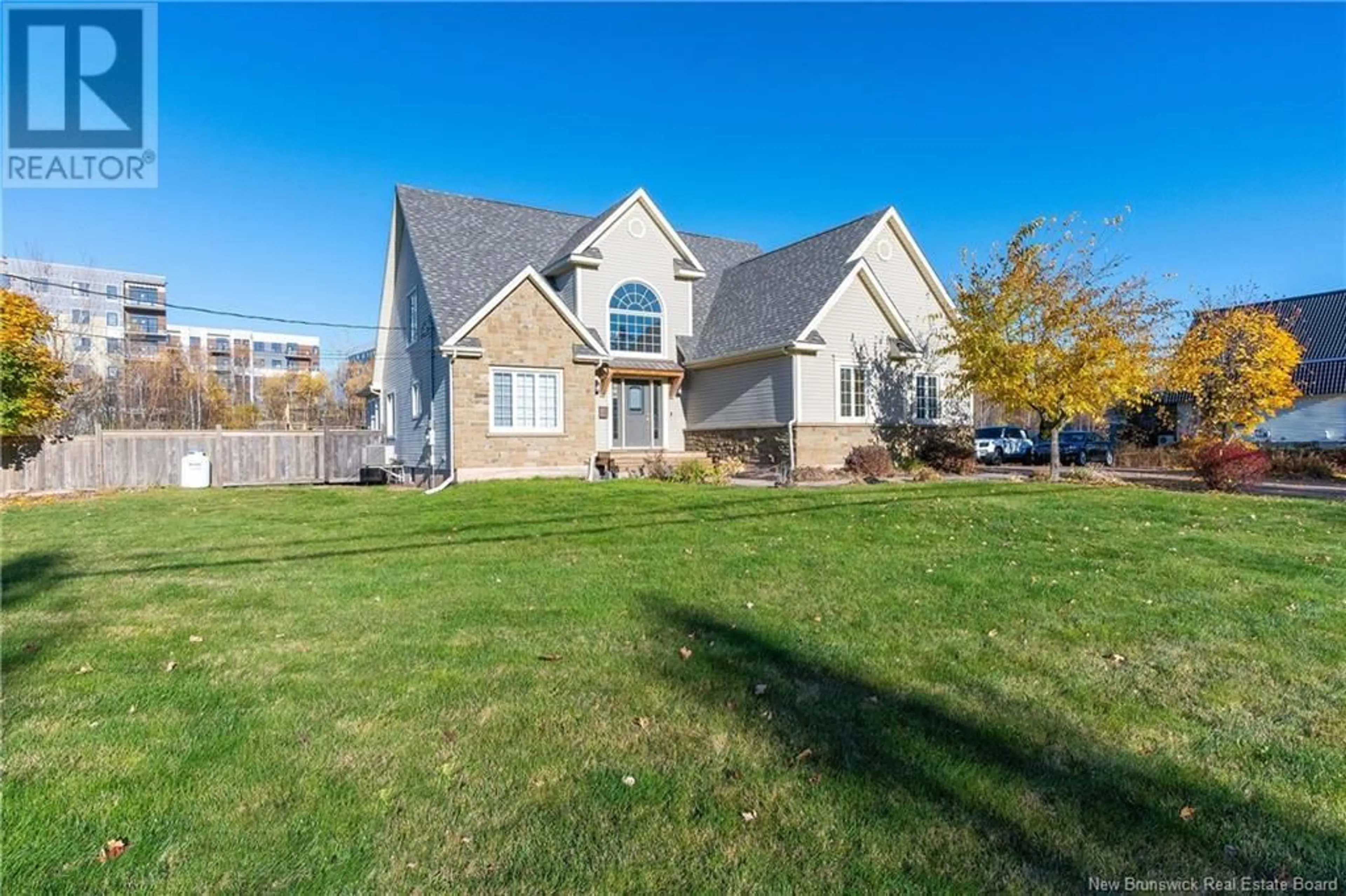 Frontside or backside of a home, the fenced backyard for 733 Chartersville, Dieppe New Brunswick E1A1K7