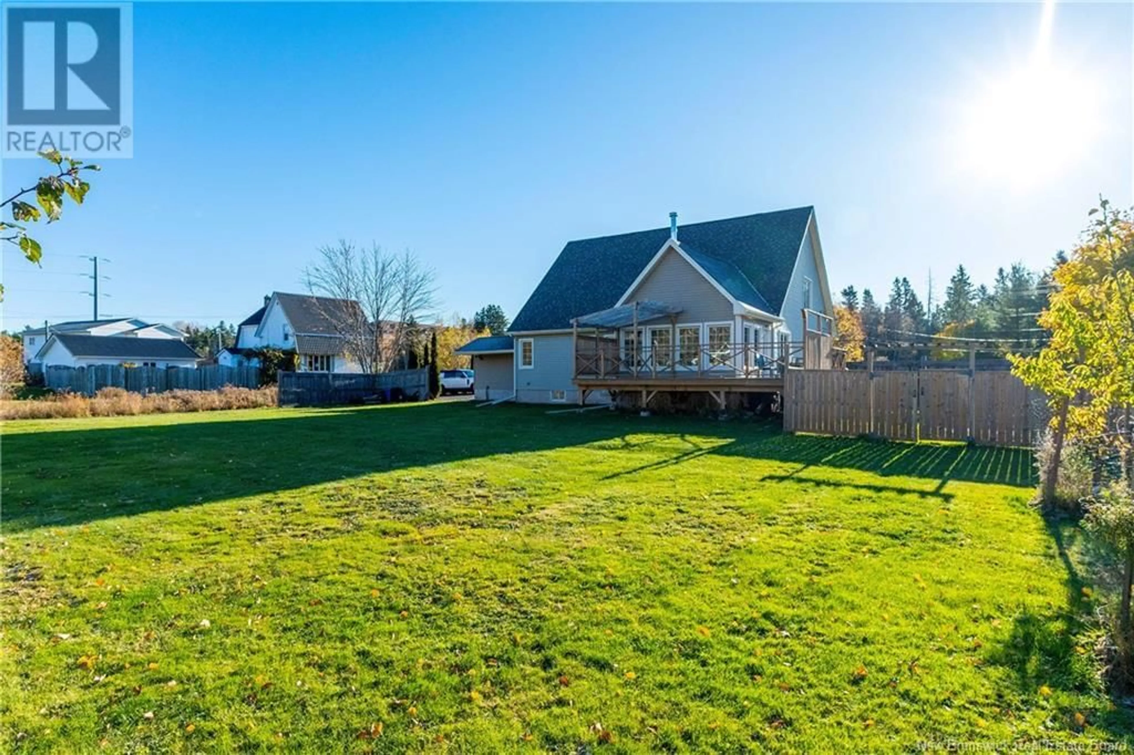 Frontside or backside of a home, the fenced backyard for 733 Chartersville, Dieppe New Brunswick E1A1K7