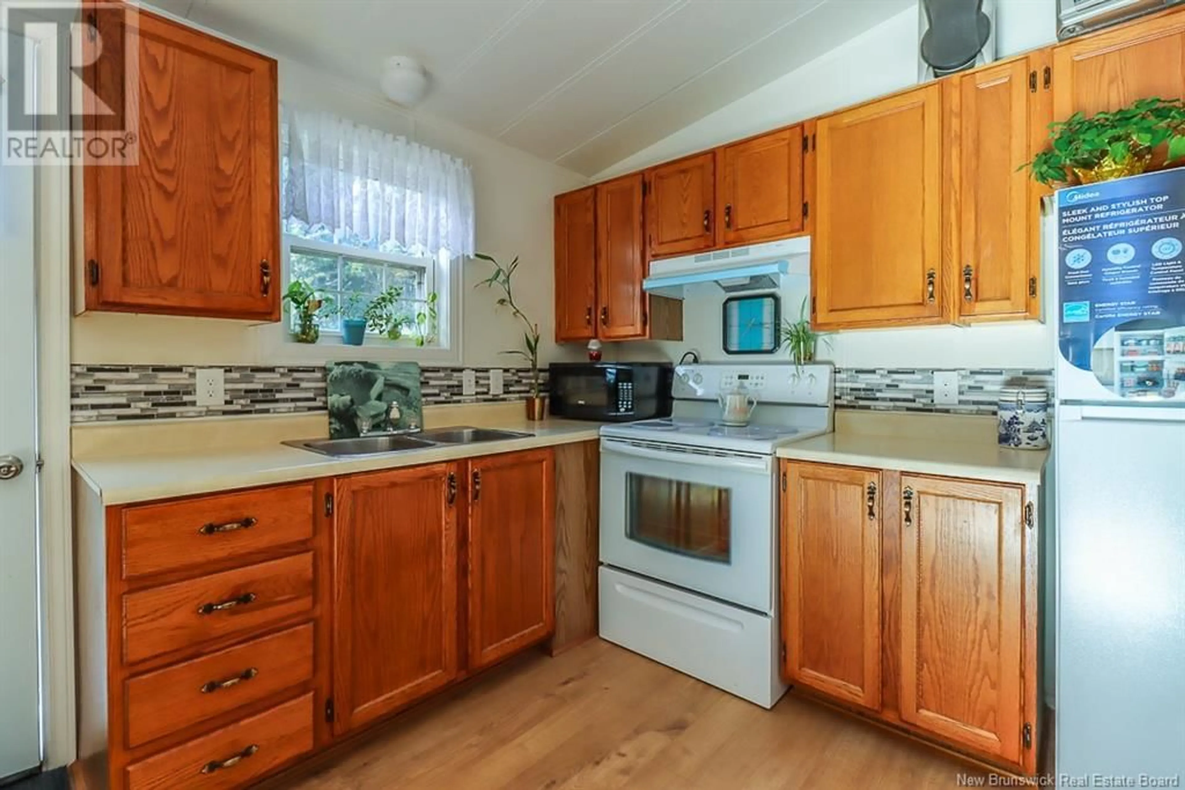 Standard kitchen, wood floors, cottage for 85 McLeod Road, Saint John New Brunswick E2J4S6