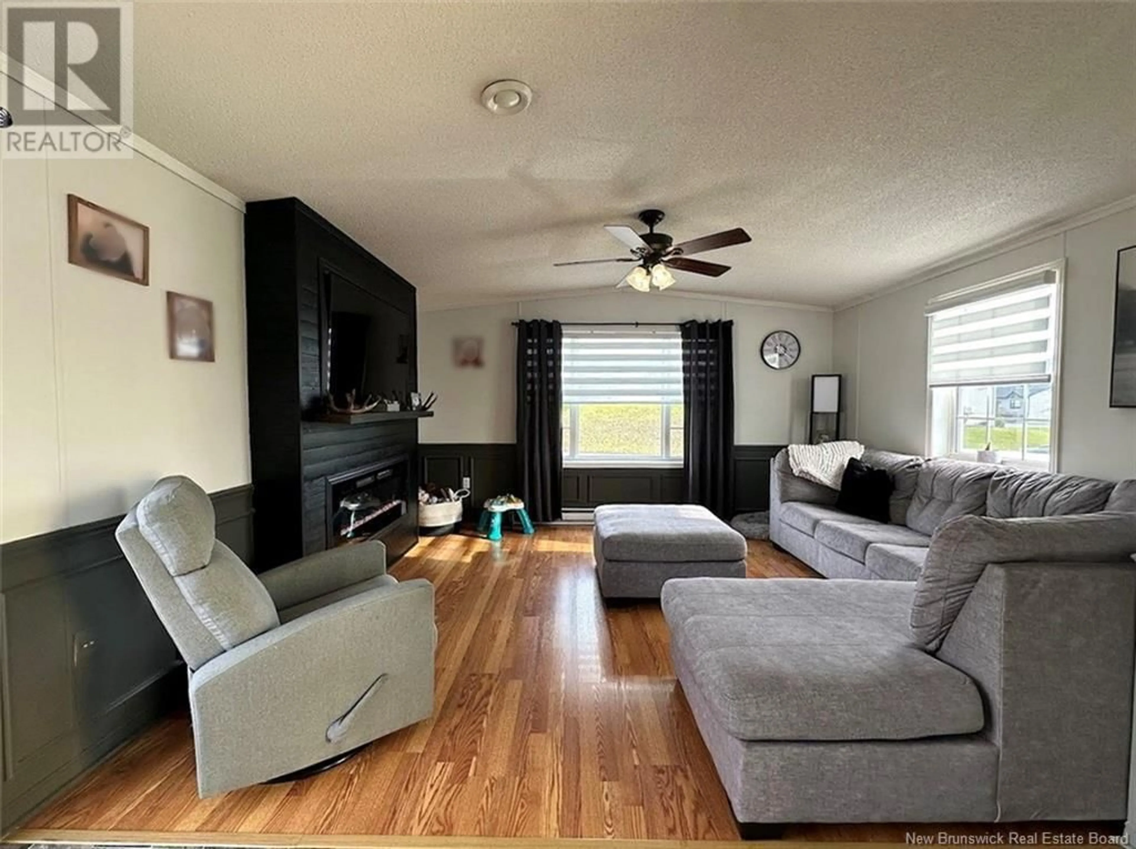 Living room, wood floors for 1 Pascal Street, Saint-Jacques New Brunswick E7B2X4