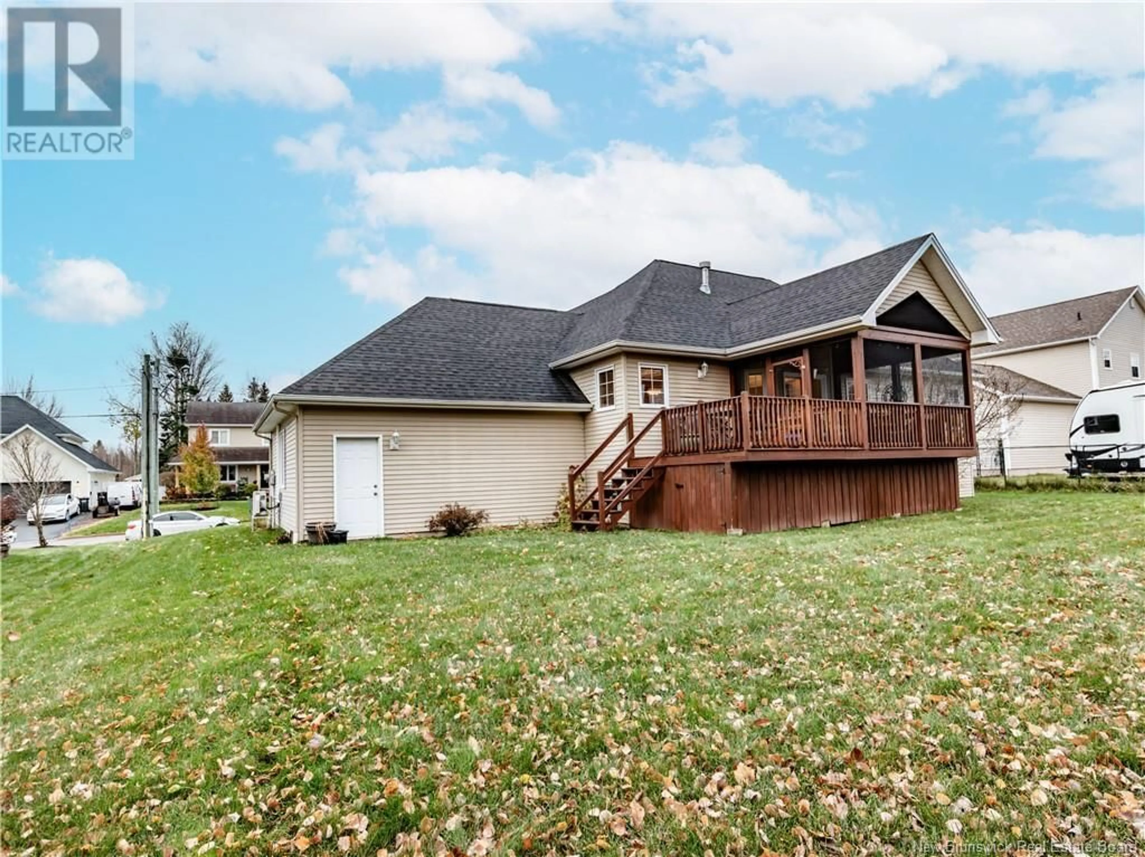 Frontside or backside of a home, the fenced backyard for 23 DESROSIERS, Dieppe New Brunswick E1A7W5