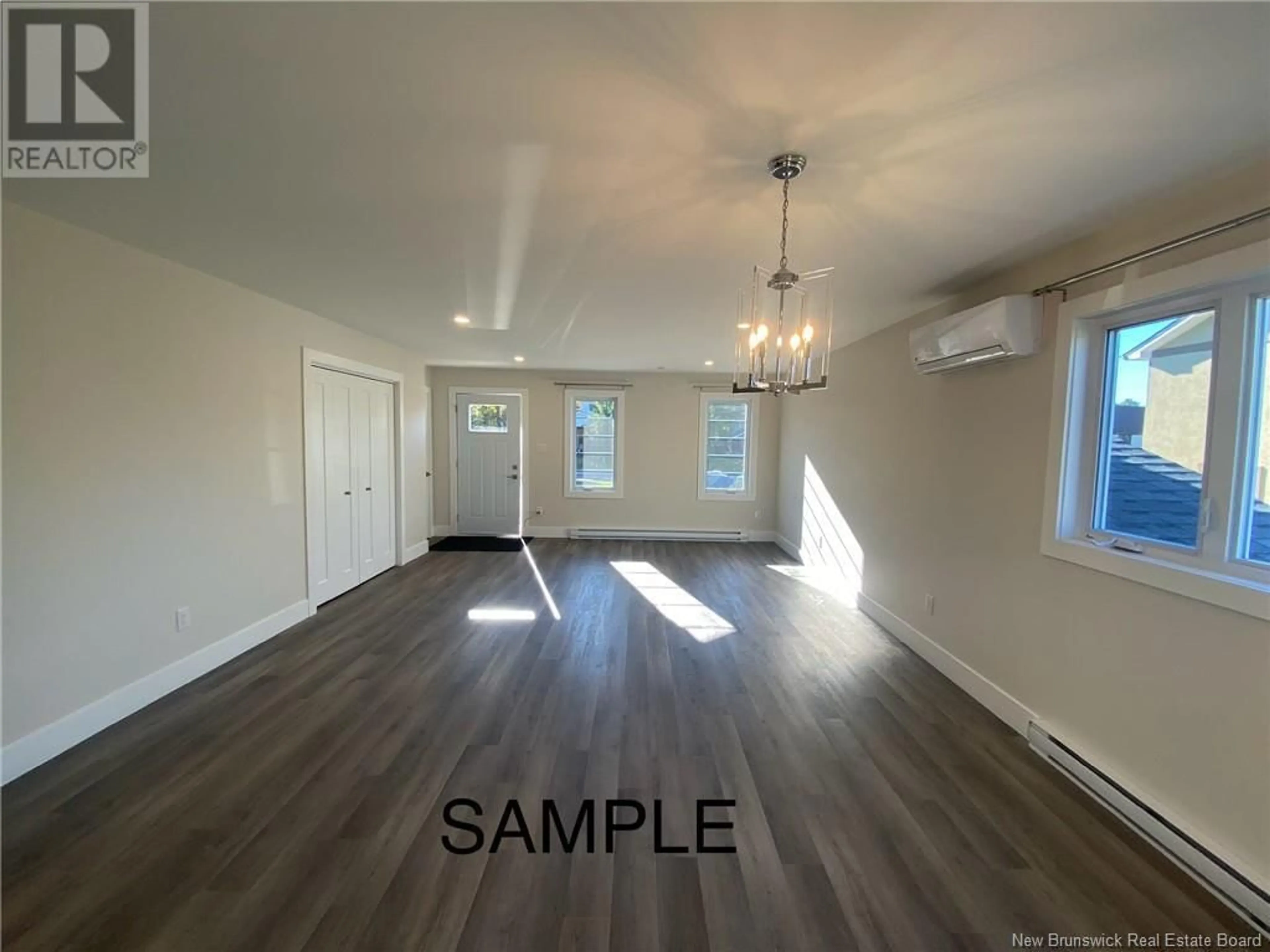 A pic of a room, wood floors for 308 Highlandview, Moncton New Brunswick E1A2L4