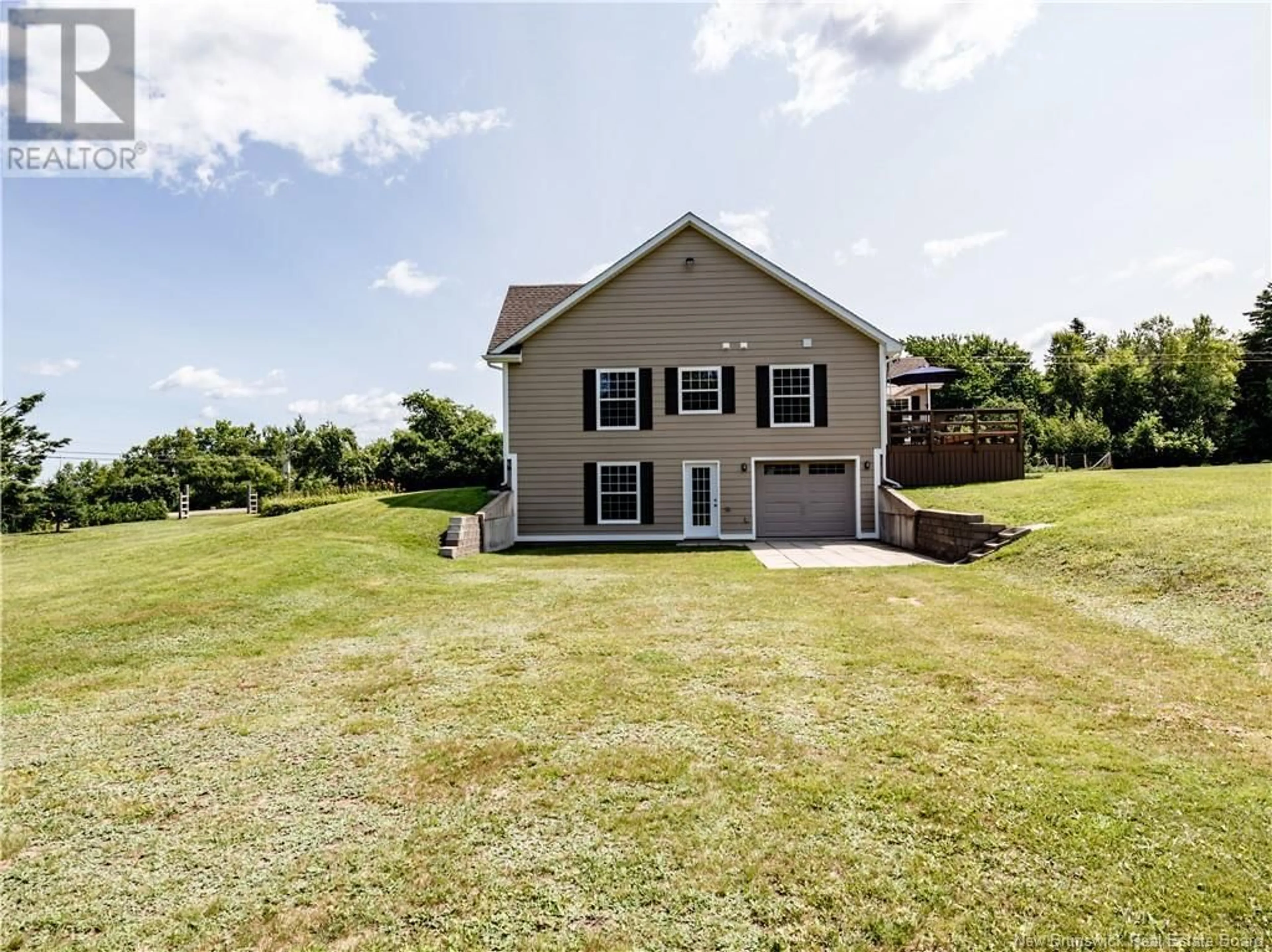 Frontside or backside of a home, the fenced backyard for 136 S Shediac River, Shediac River New Brunswick E4R1Y3