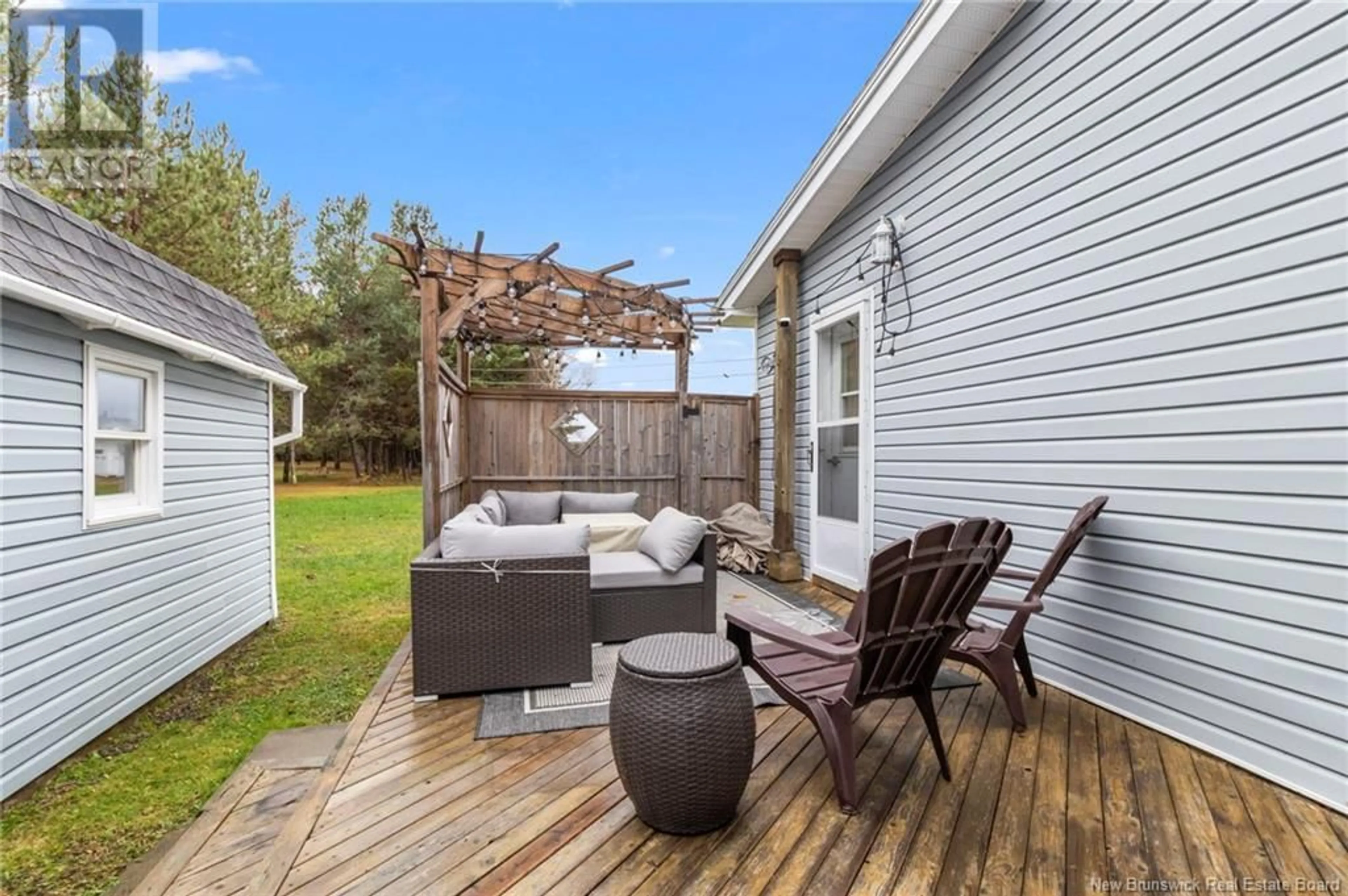 Patio, the fenced backyard for 3769 Route 134, Shediac Bridge New Brunswick E4R1T3