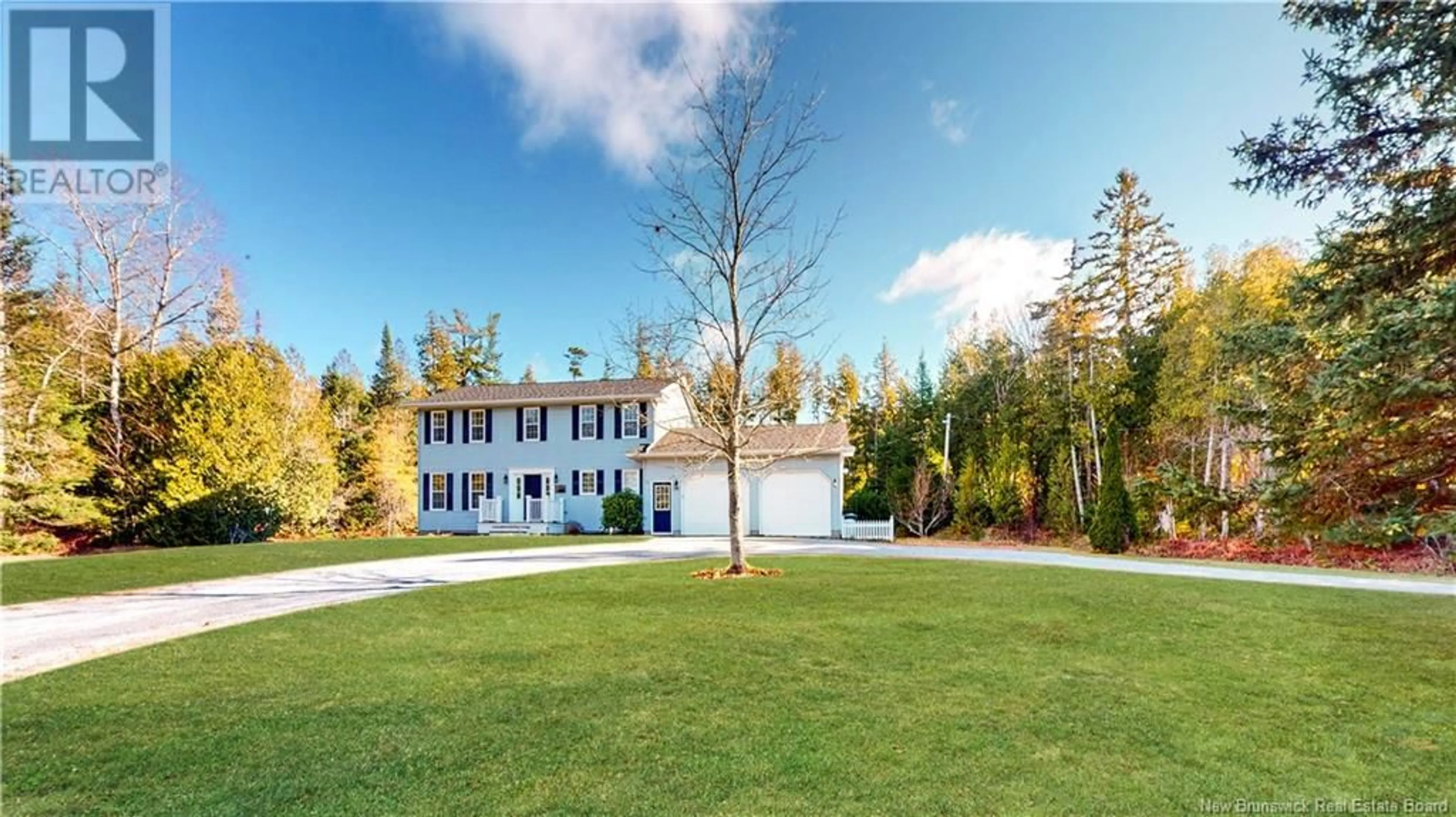 Frontside or backside of a home, the fenced backyard for 43 Elliot Road, Quispamsis New Brunswick E2G2B5