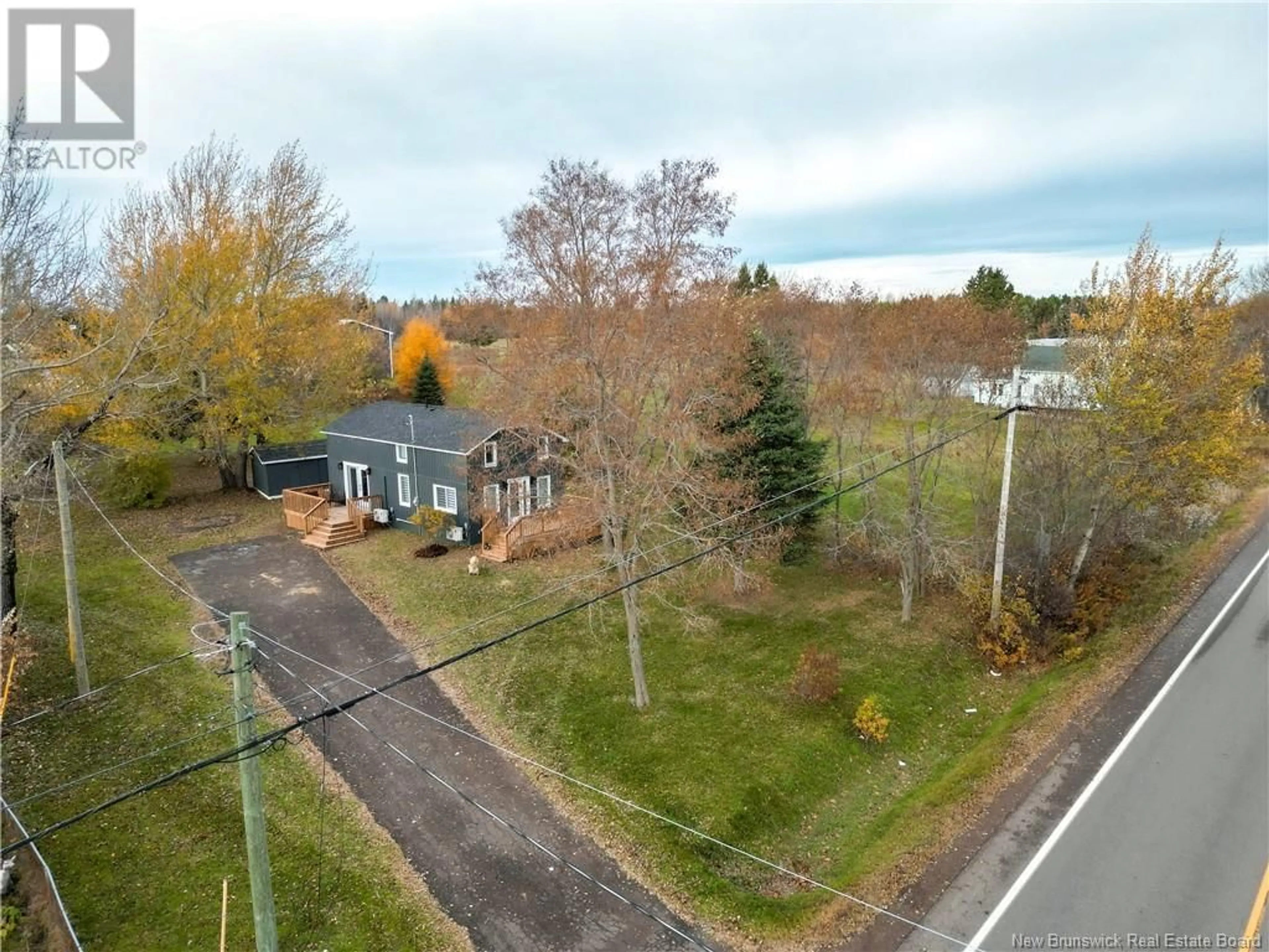 A pic from exterior of the house or condo, the fenced backyard for 4808 Route 134, Cocagne New Brunswick E4R2Z9