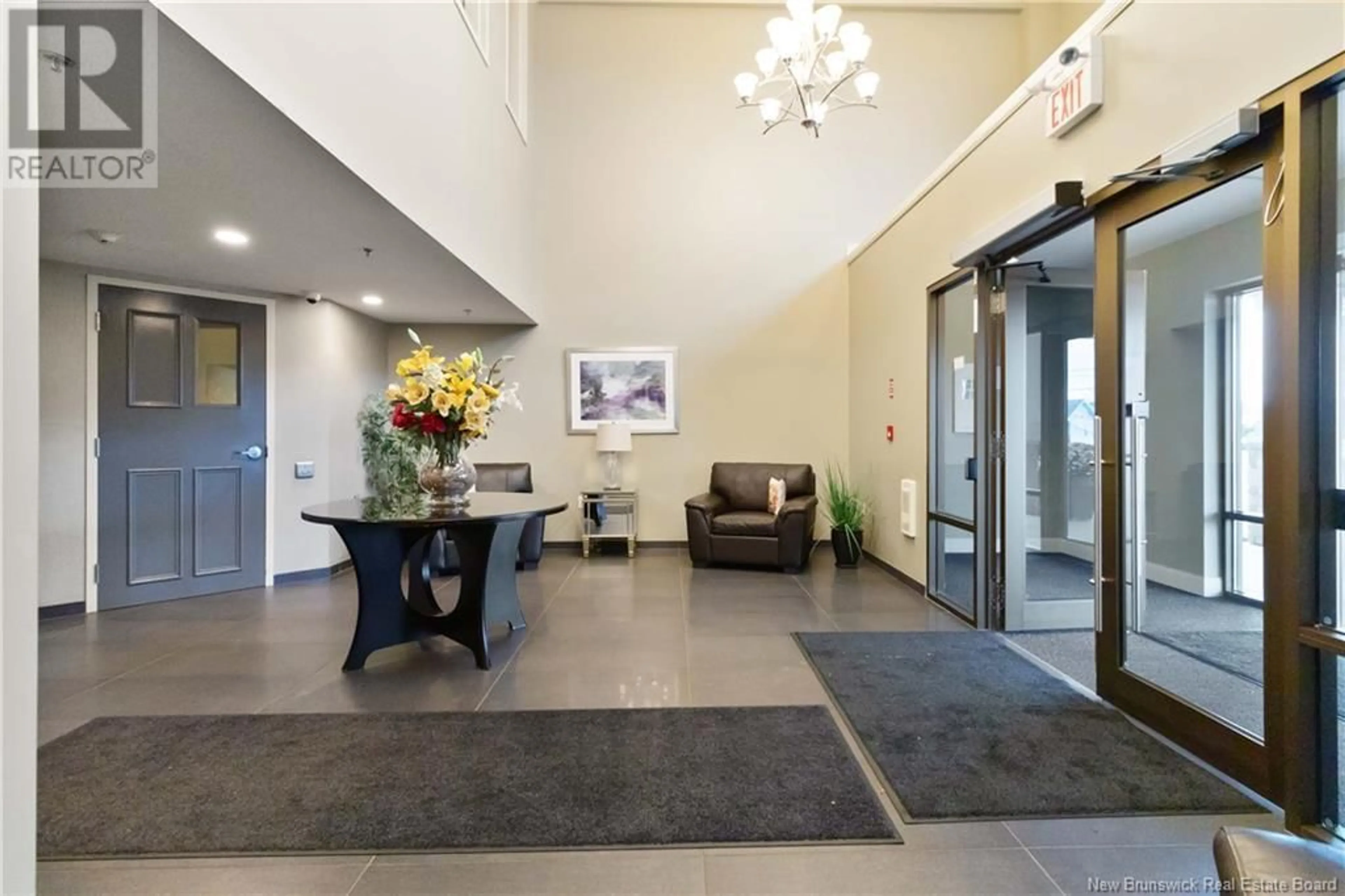 Indoor lobby, carpet floors for 88 WOODS Terrace Unit# 208, Moncton New Brunswick E1G1X6