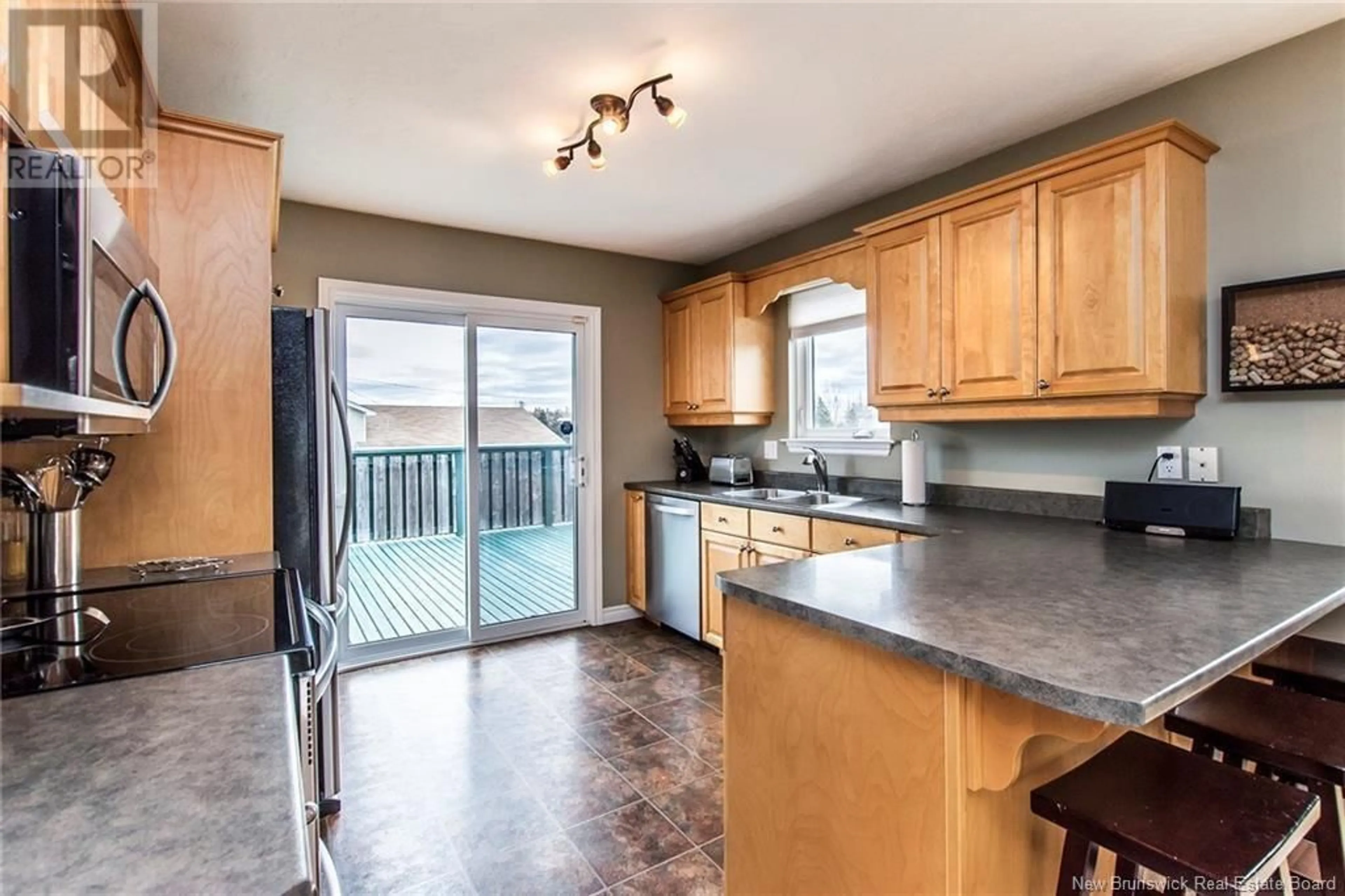 Open concept kitchen for 5 Acton Court, Moncton New Brunswick E1G2K3