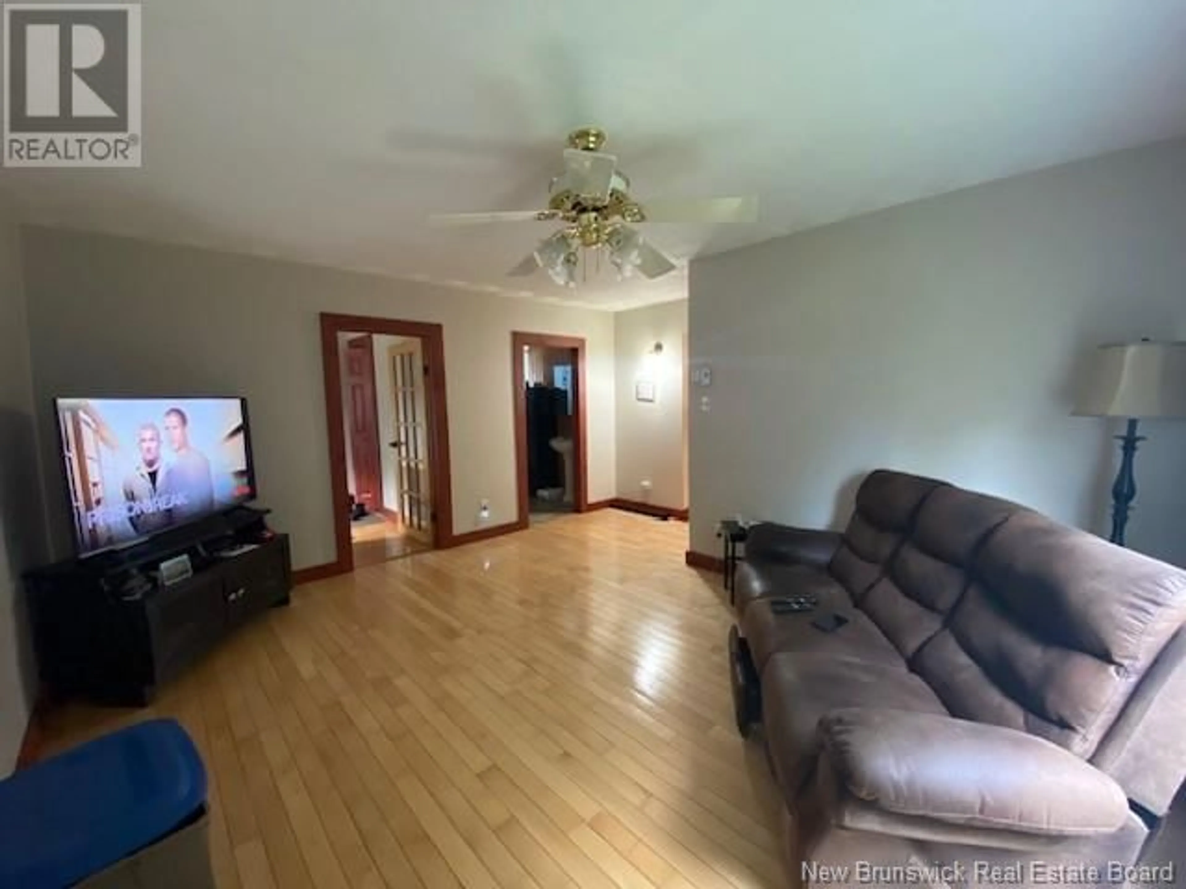 A pic of a room, wood floors for 17 Evangeline Street, Saint-Quentin New Brunswick E8A1M8