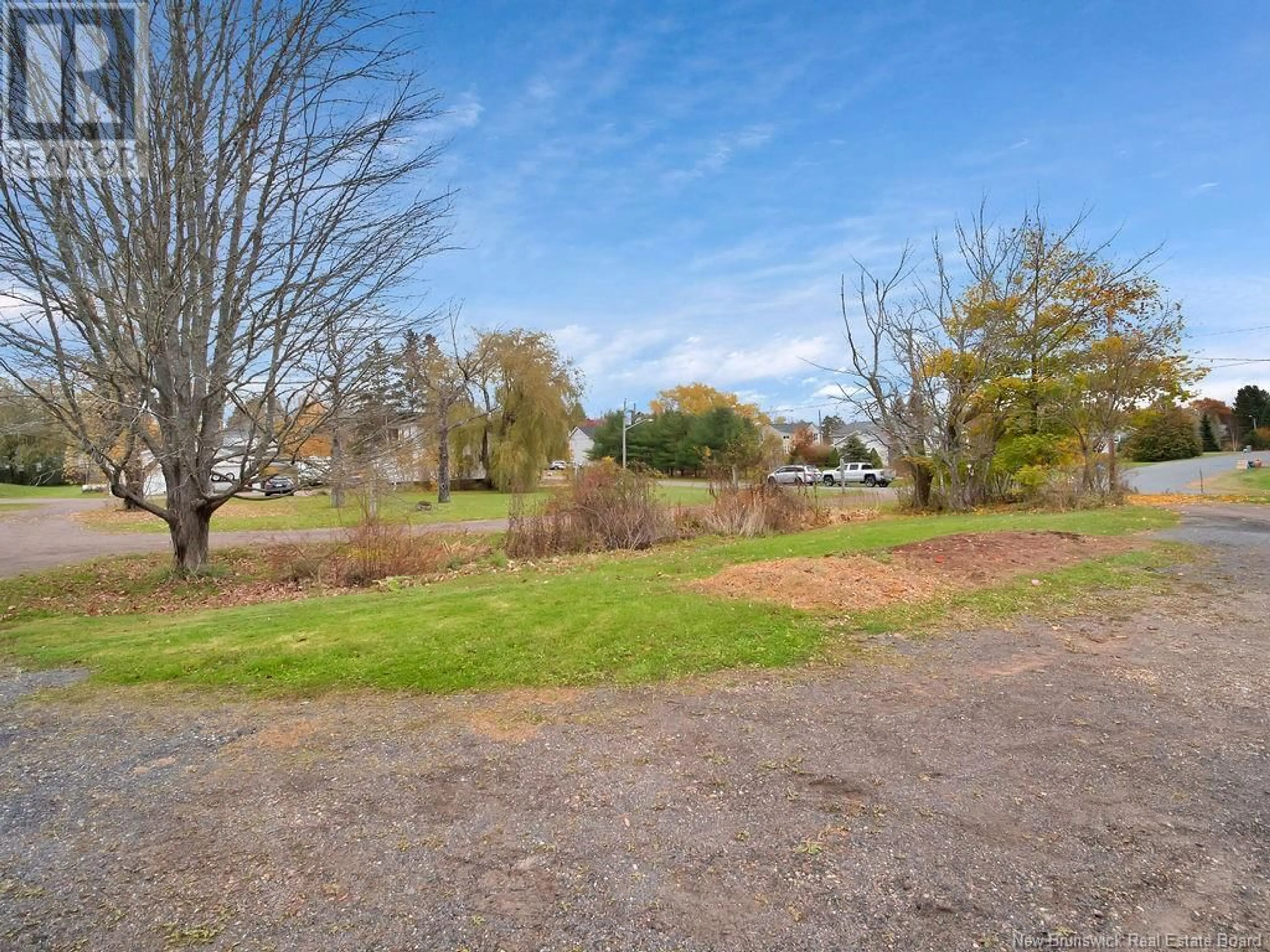 Frontside or backside of a home, the fenced backyard for 11 Maple Avenue, Sackville New Brunswick E4L4C5