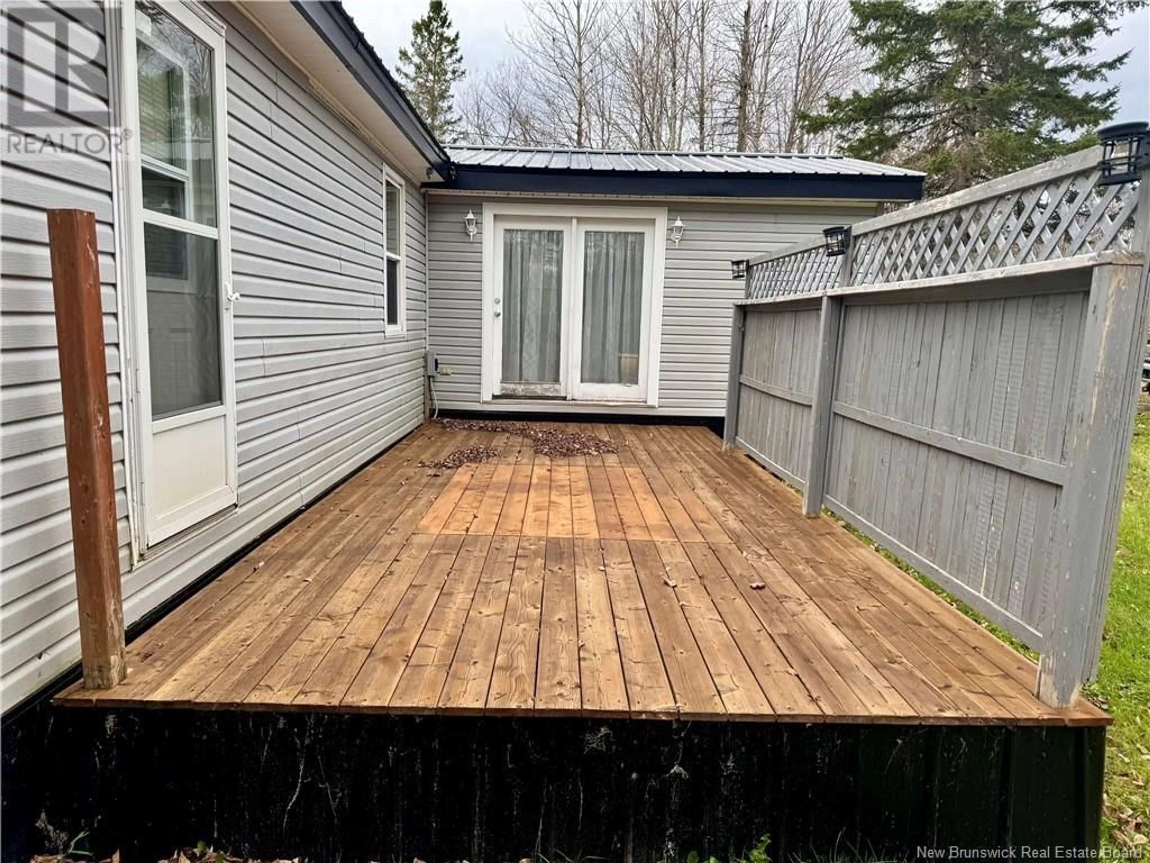 Patio, the fenced backyard for 527 Route 740, Heathland New Brunswick E3L5B2