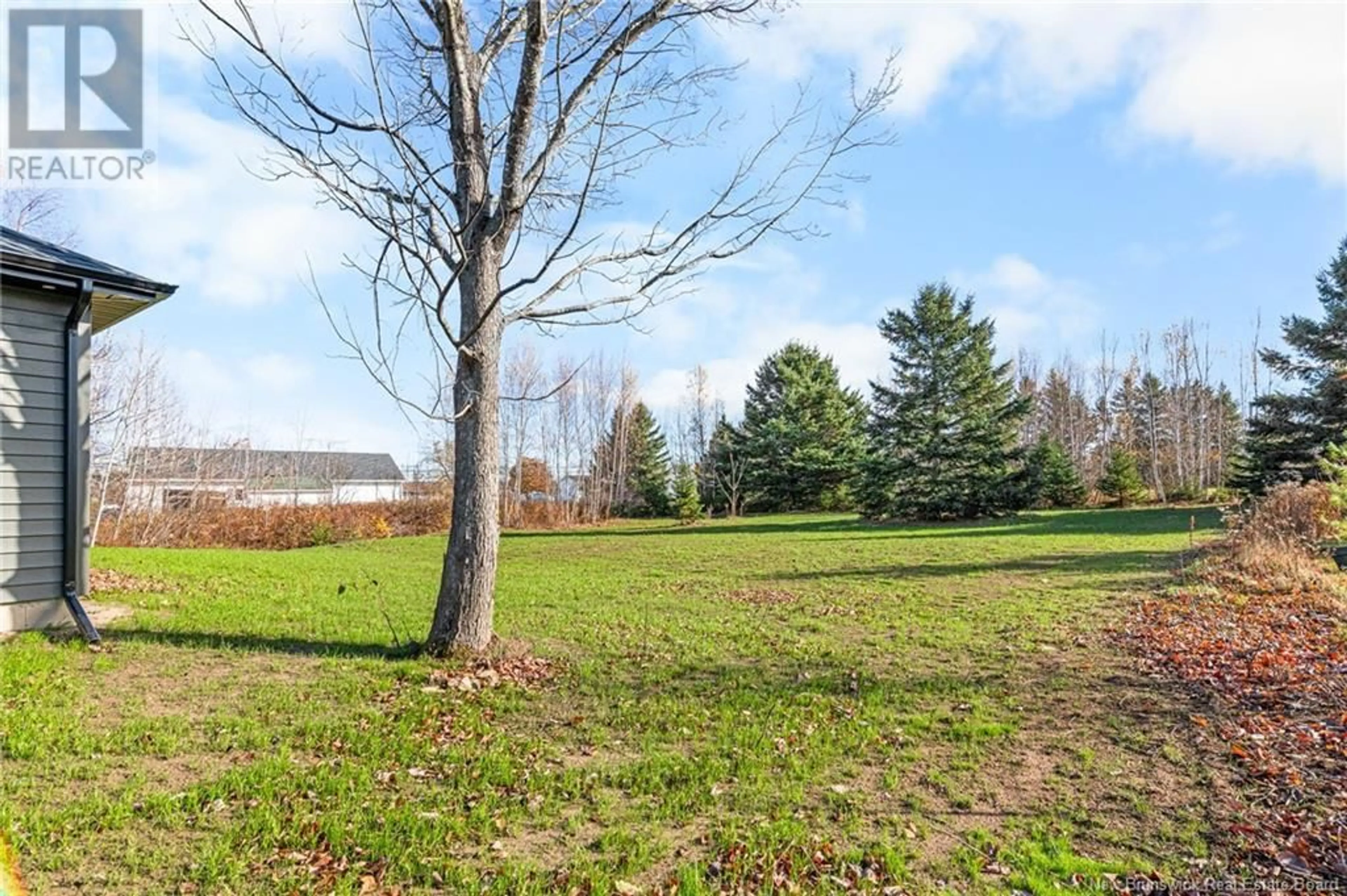 Patio, the fenced backyard for 8 Irene Avenue, Bouctouche New Brunswick E4S2V3