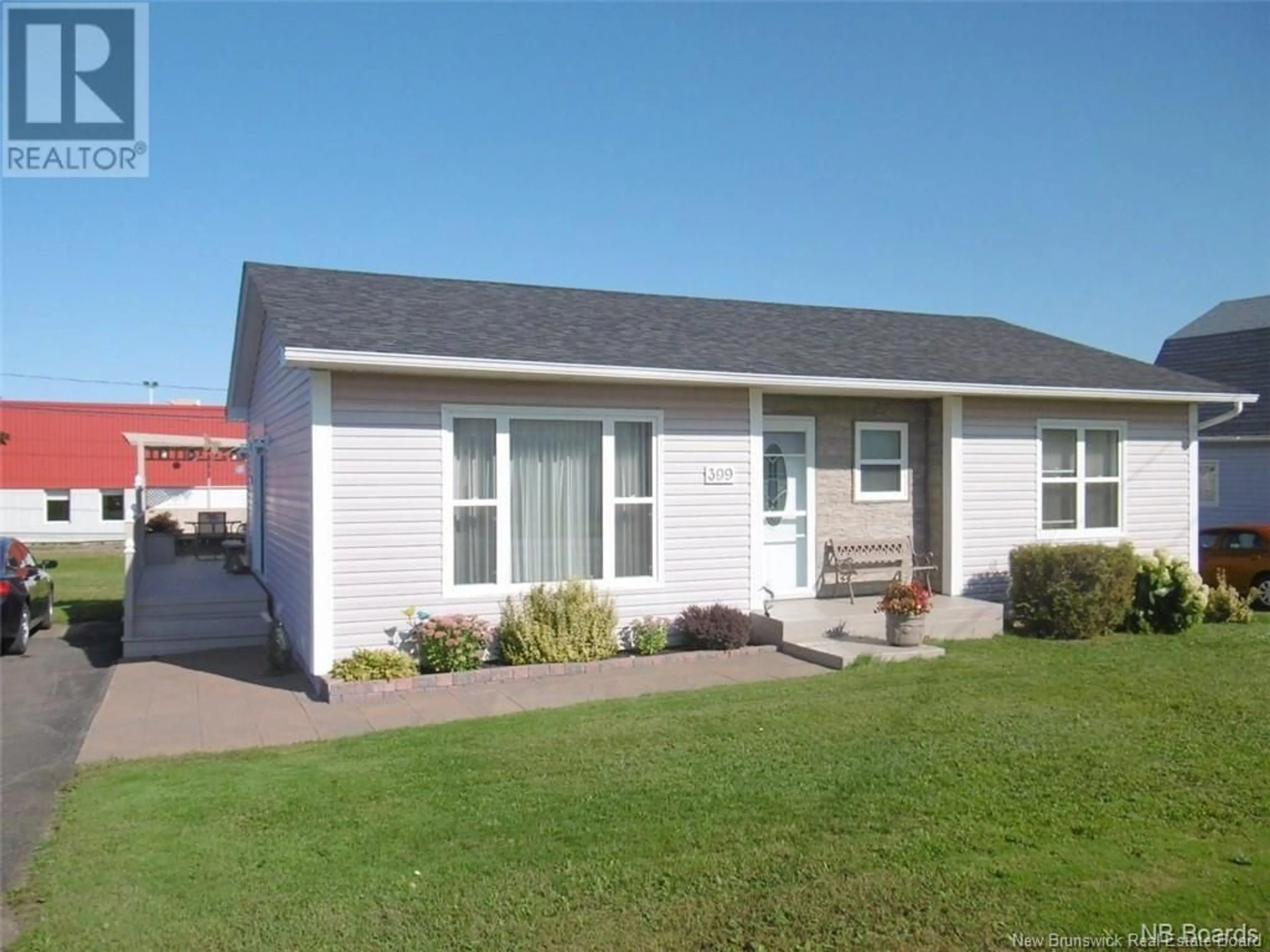 Frontside or backside of a home, the front or back of building for 399 Rue Arseneau, Tracadie New Brunswick E1X1B3