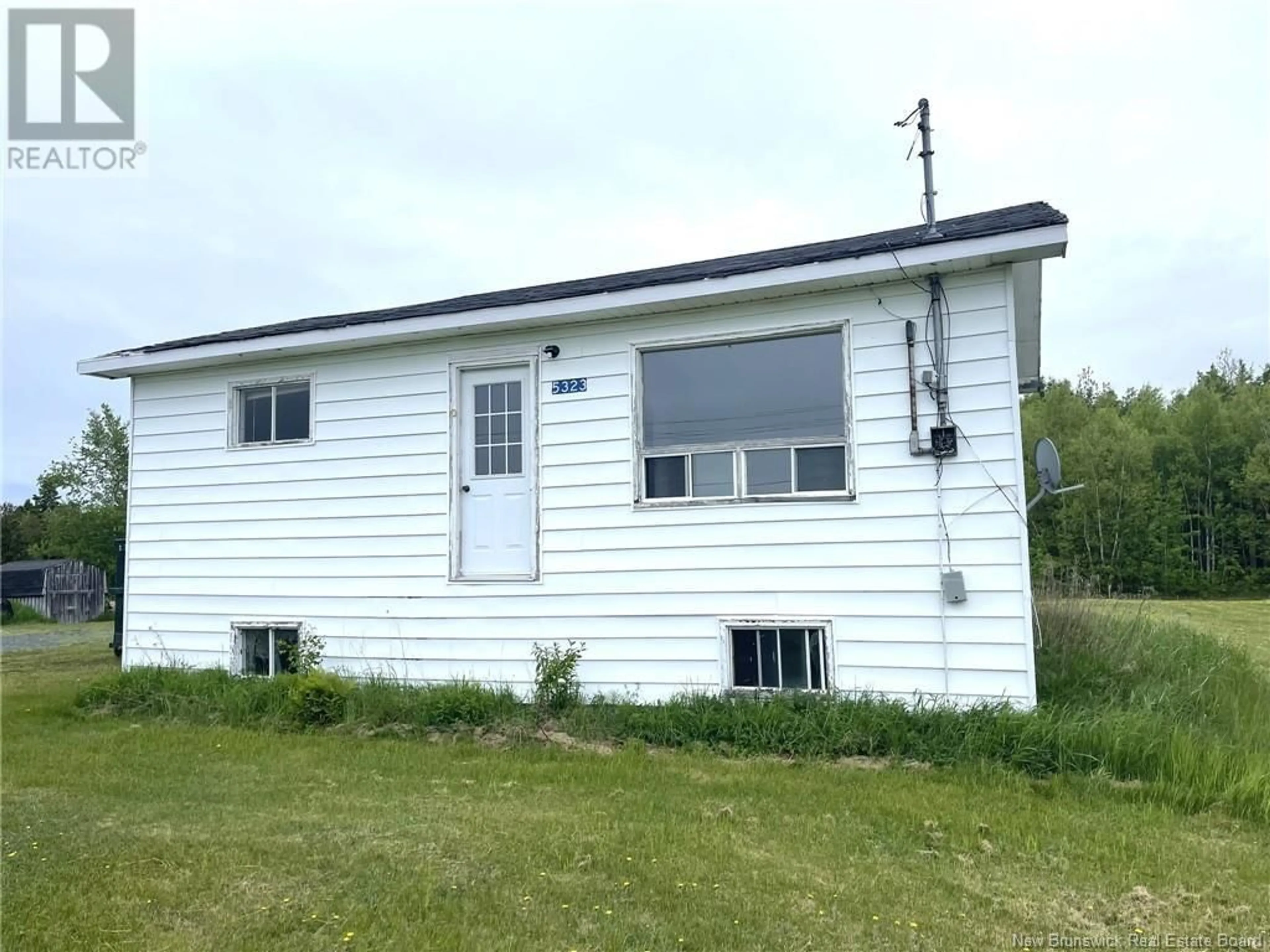 Frontside or backside of a home, cottage for 5323 117 Route, Baie-Sainte-Anne New Brunswick E9A1C9