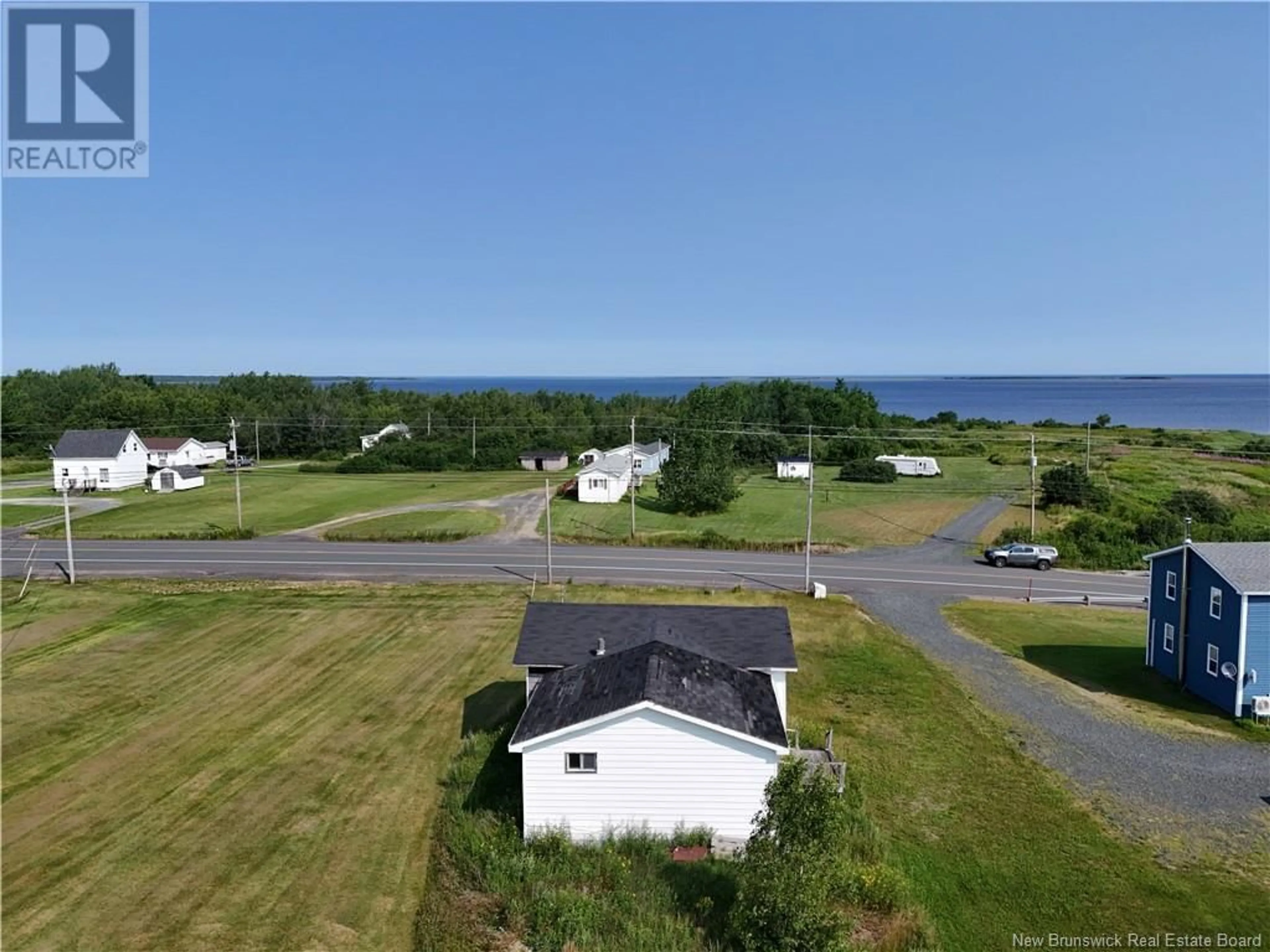 A pic from exterior of the house or condo, the street view for 5323 117 Route, Baie-Sainte-Anne New Brunswick E9A1C9