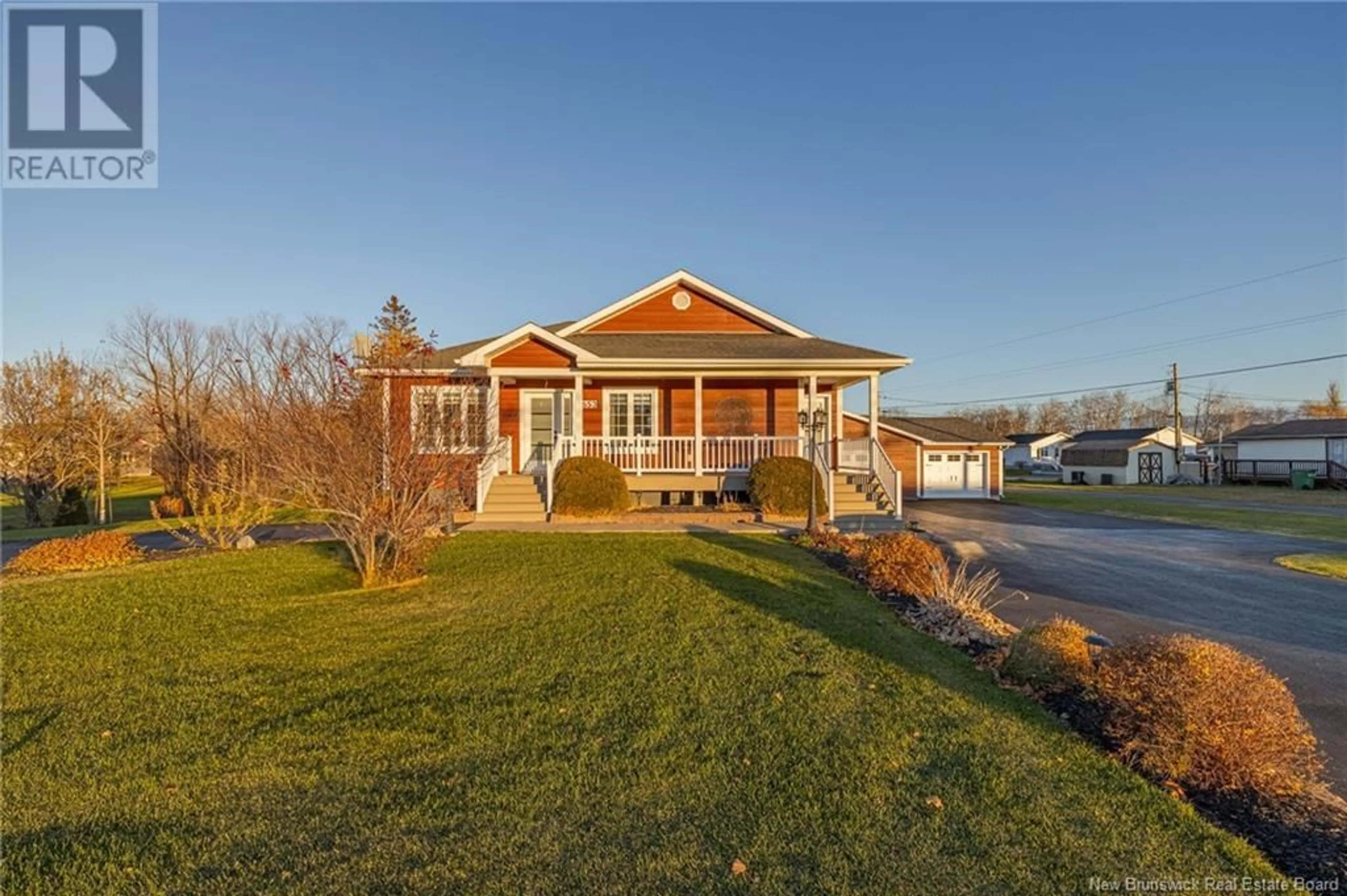 Frontside or backside of a home, cottage for 653 Rue Principale, Beresford New Brunswick E8K3X5