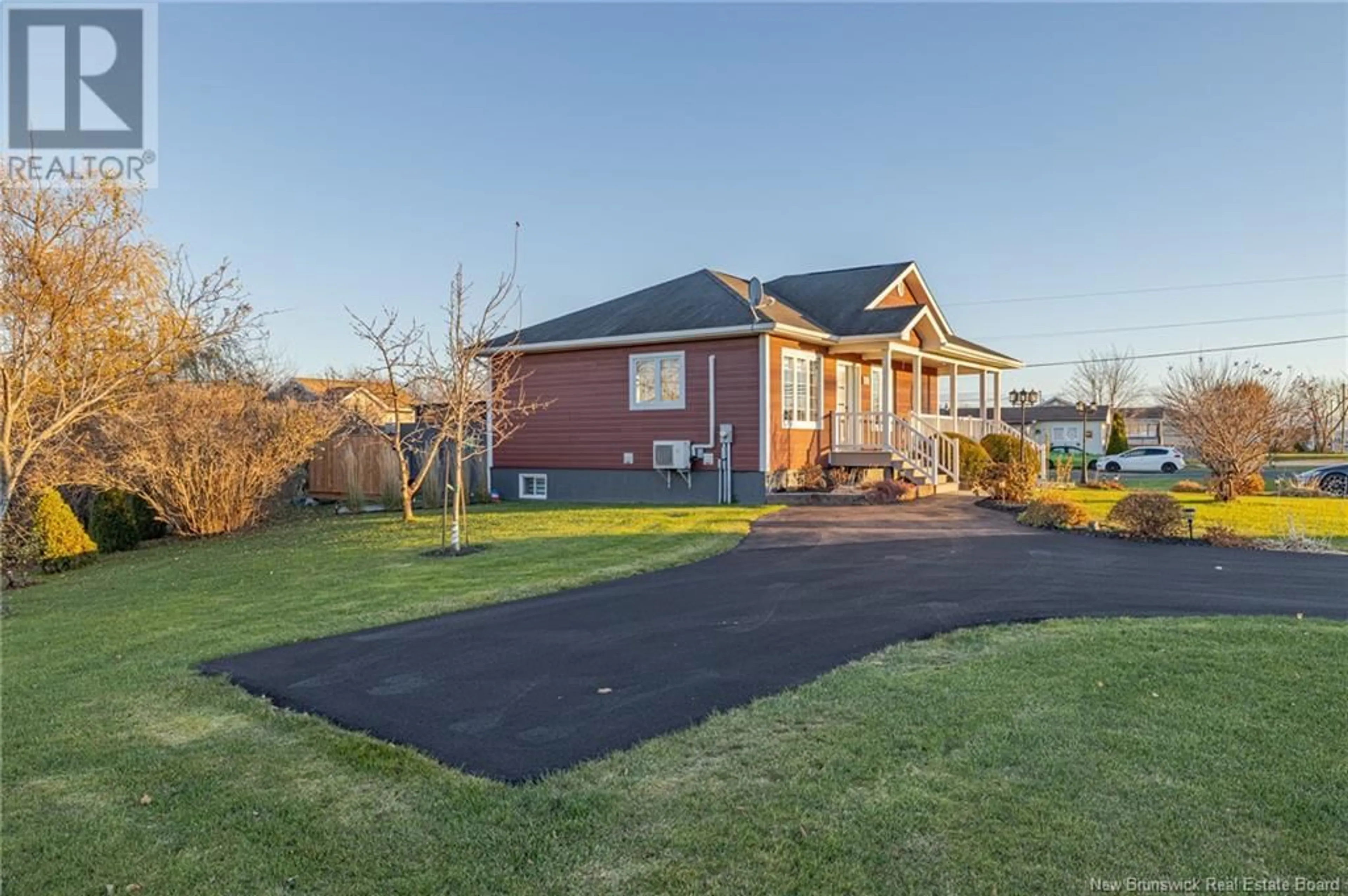 Frontside or backside of a home, cottage for 653 Rue Principale, Beresford New Brunswick E8K3X5