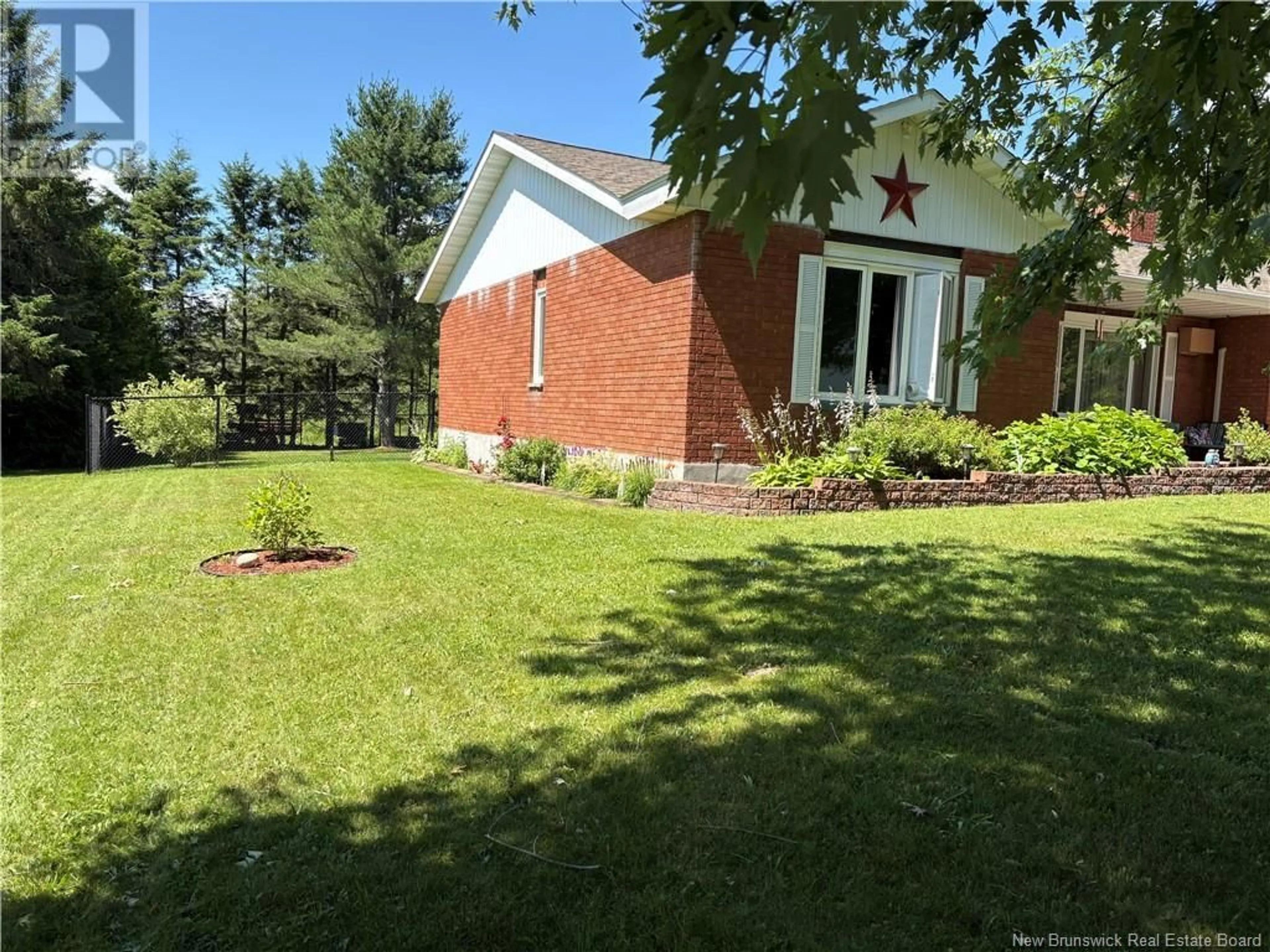 A pic from outside/outdoor area/front of a property/back of a property/a pic from drone, unknown for 8 DAIGLE STREET, Saint-Léonard New Brunswick E7E2G5