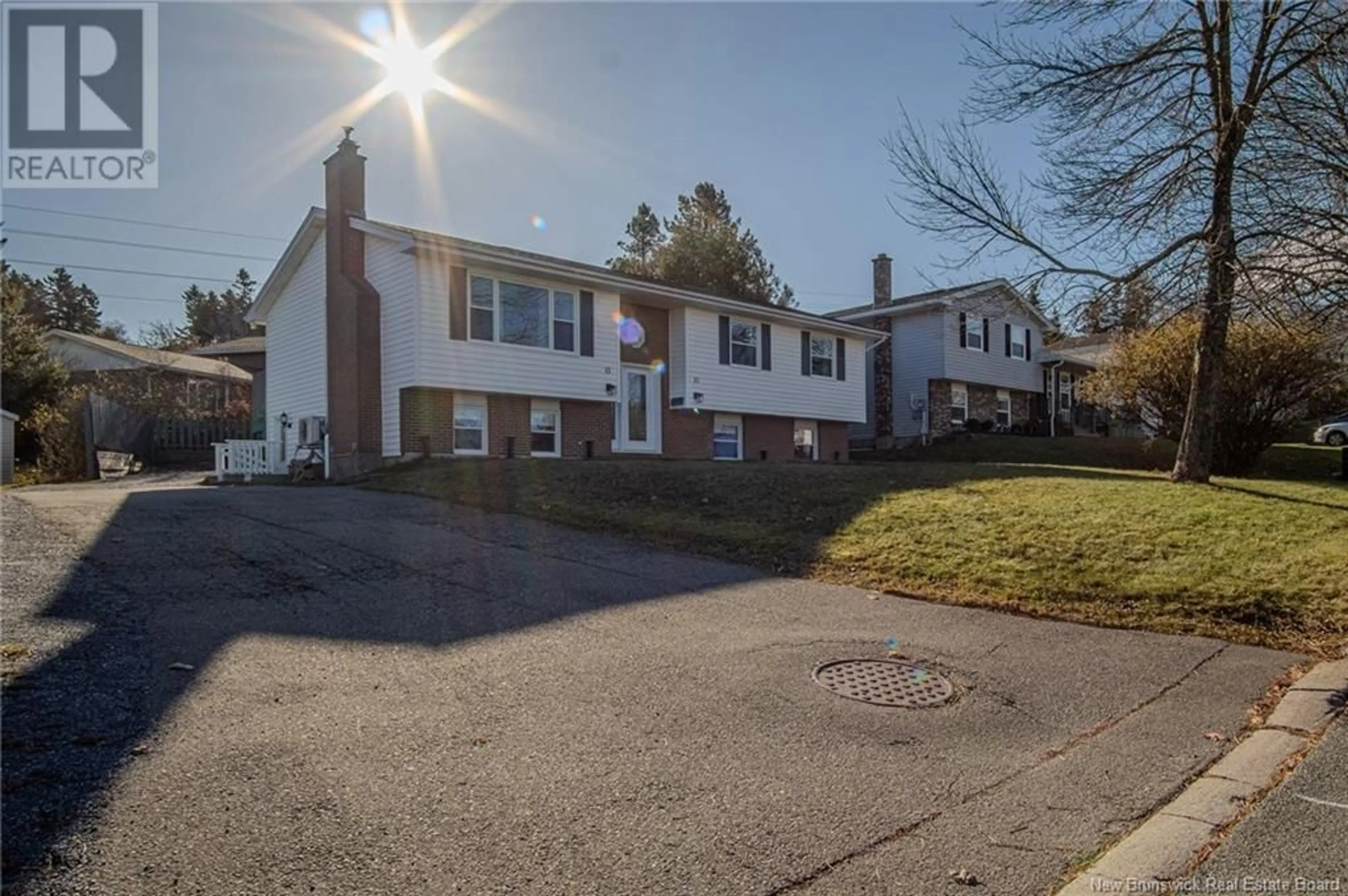 Frontside or backside of a home, the street view for 15 Sandalwood Crescent, Saint John New Brunswick E2M5L1