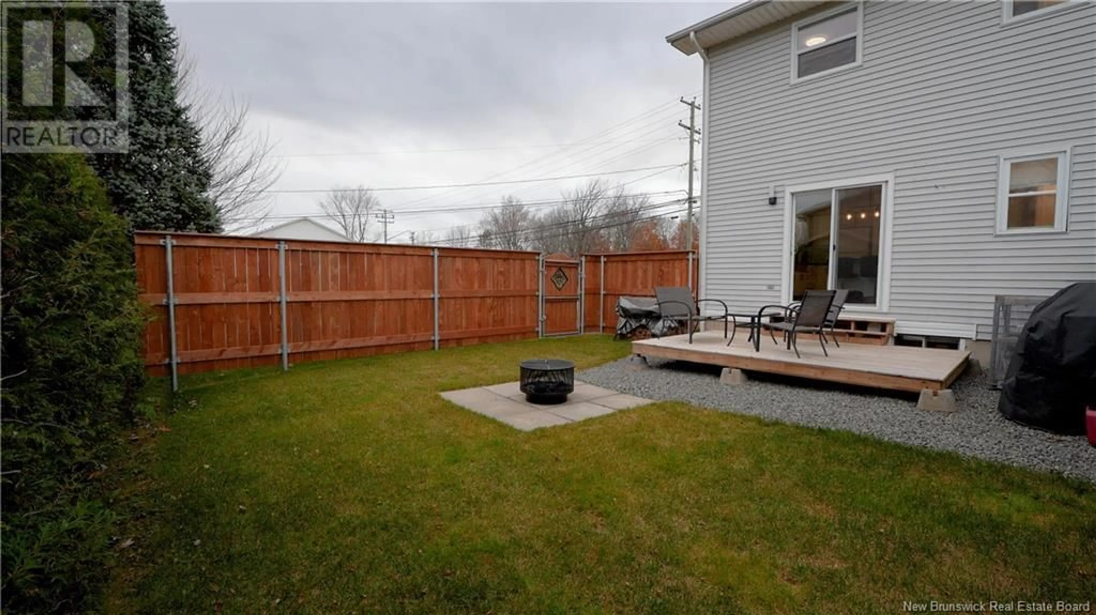 Patio, the fenced backyard for 469 Amirault Street, Dieppe New Brunswick E1A6R6