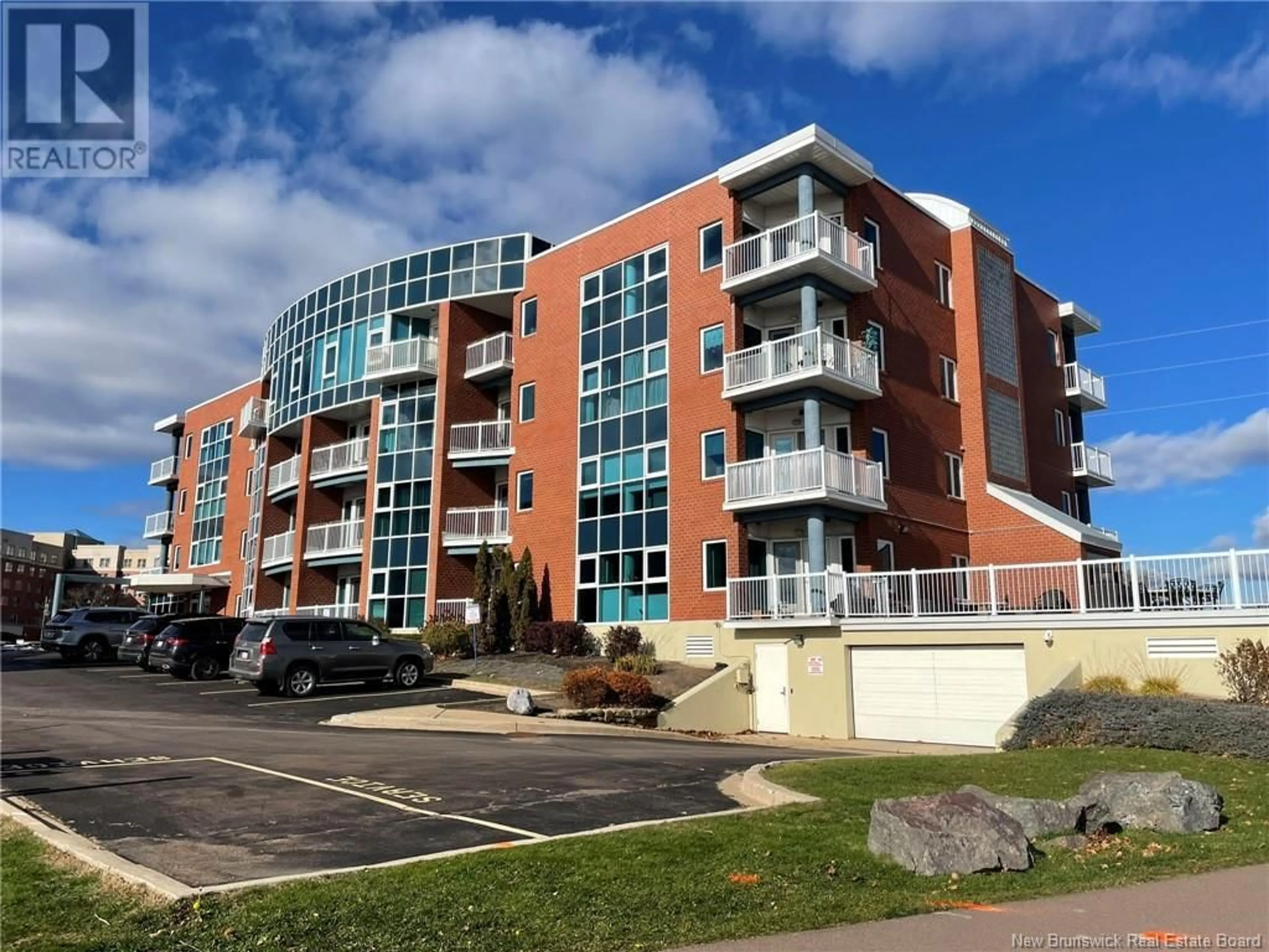 A pic from exterior of the house or condo, the front or back of building for 50 Assomption Avenue Unit# 203, Moncton New Brunswick E1C0C5