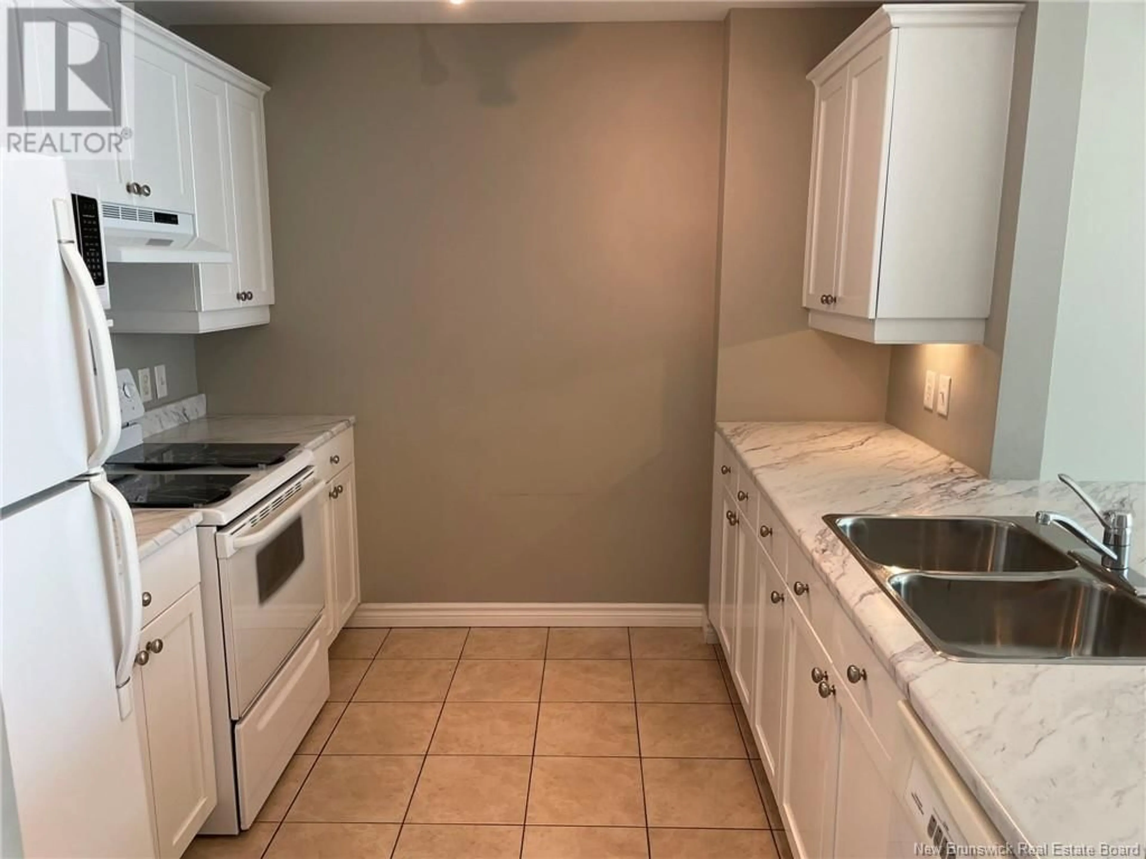 Standard kitchen, not visible floor, cottage for 50 Assomption Avenue Unit# 203, Moncton New Brunswick E1C0C5