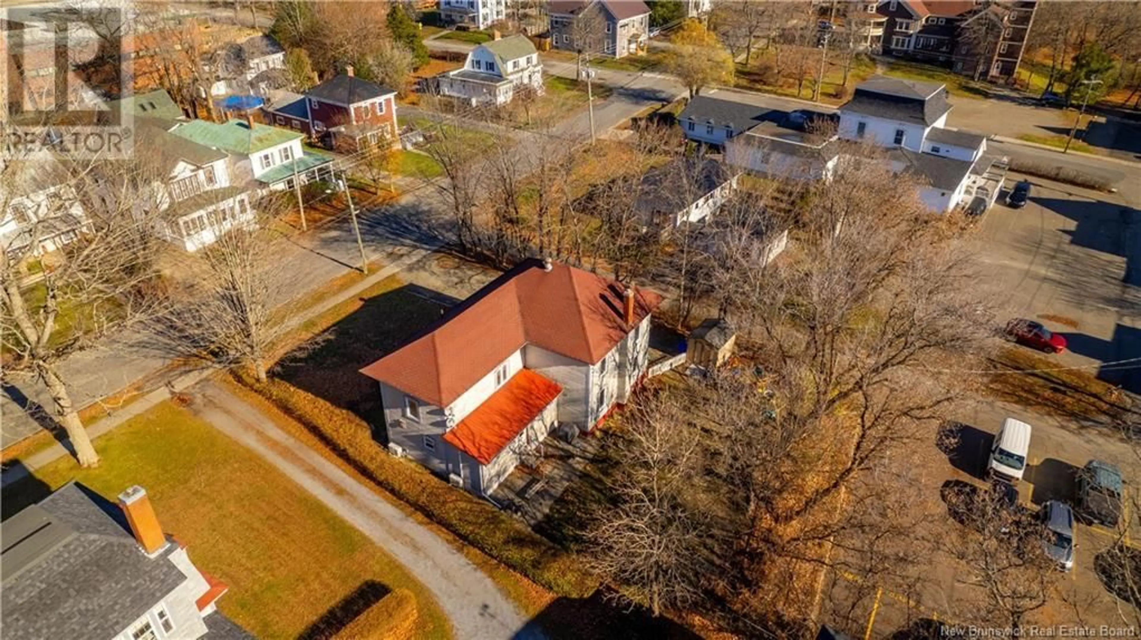 A pic from exterior of the house or condo, the fenced backyard for 38 Union Street, St. Stephen New Brunswick E3L1T5