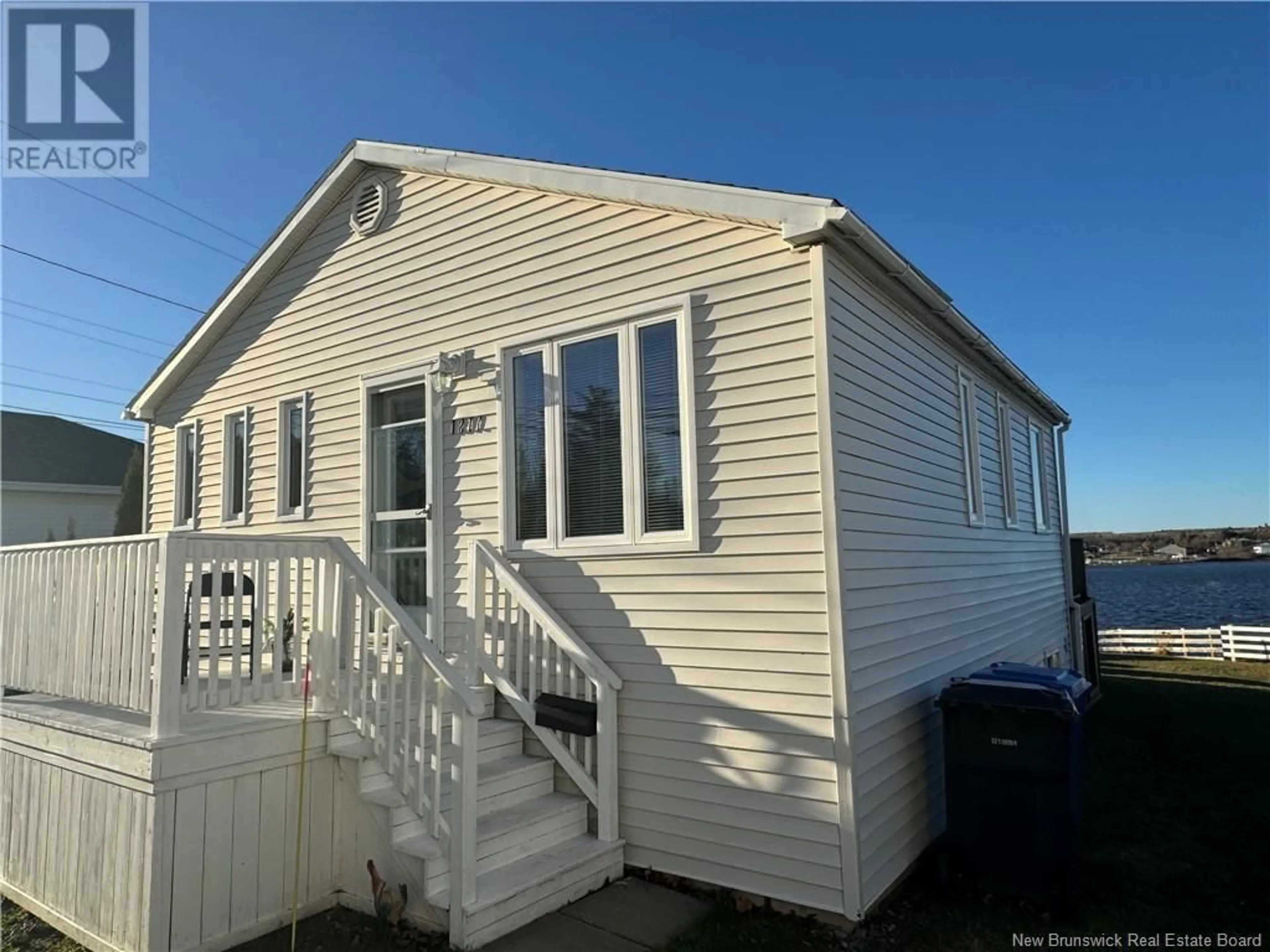 A pic from exterior of the house or condo, the front or back of building for 1217 Water Street, Miramichi New Brunswick E1N1A1