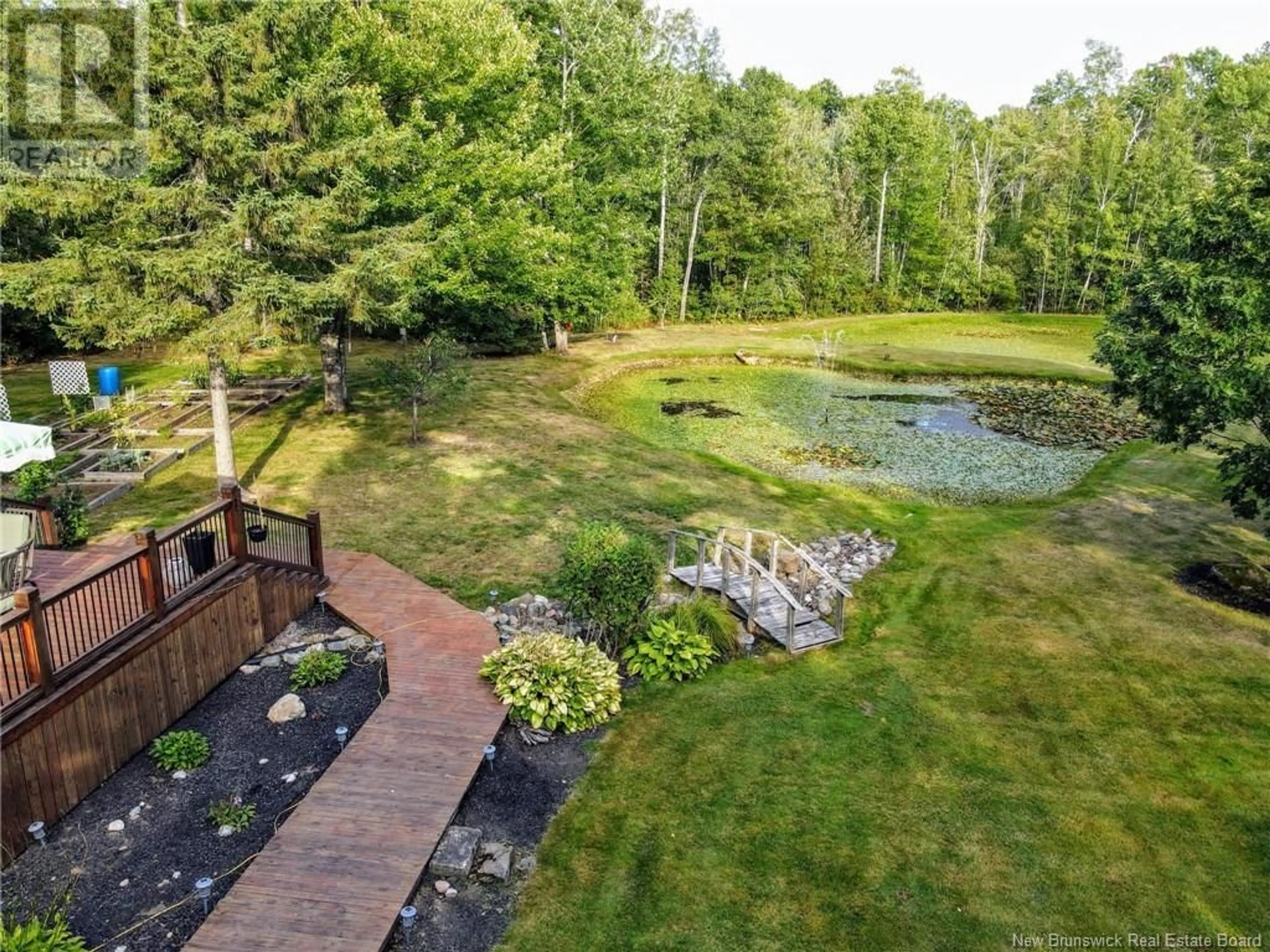 Patio, the fenced backyard for 50 Stage Coach Lane, Shediac River New Brunswick E4P9G5