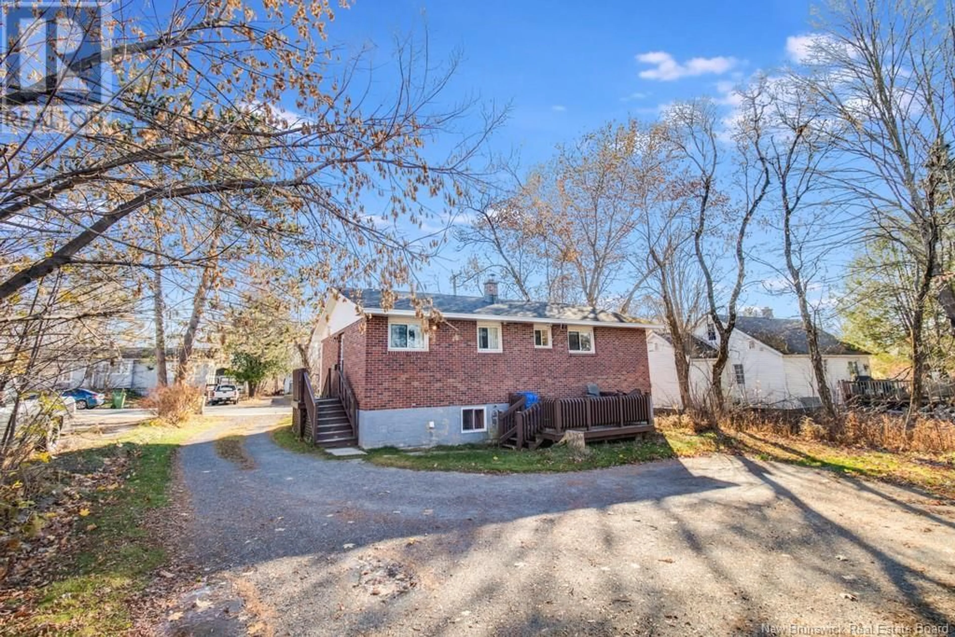 A pic from exterior of the house or condo, the fenced backyard for 269 Highland Ave Avenue, Fredericton New Brunswick E3A2S7