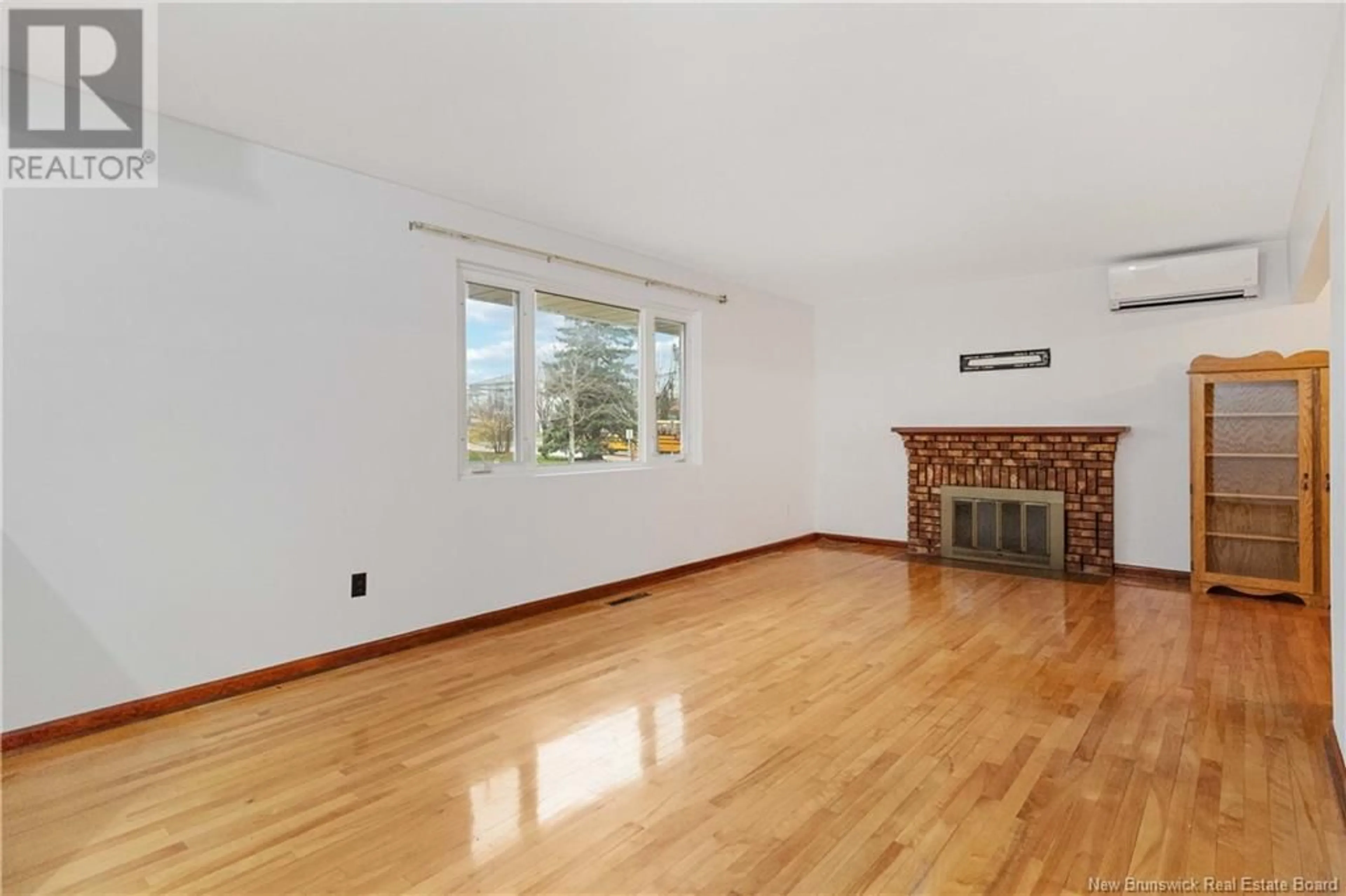 A pic of a room, wood floors for 55 Leeside Drive, Moncton New Brunswick E1C4L4