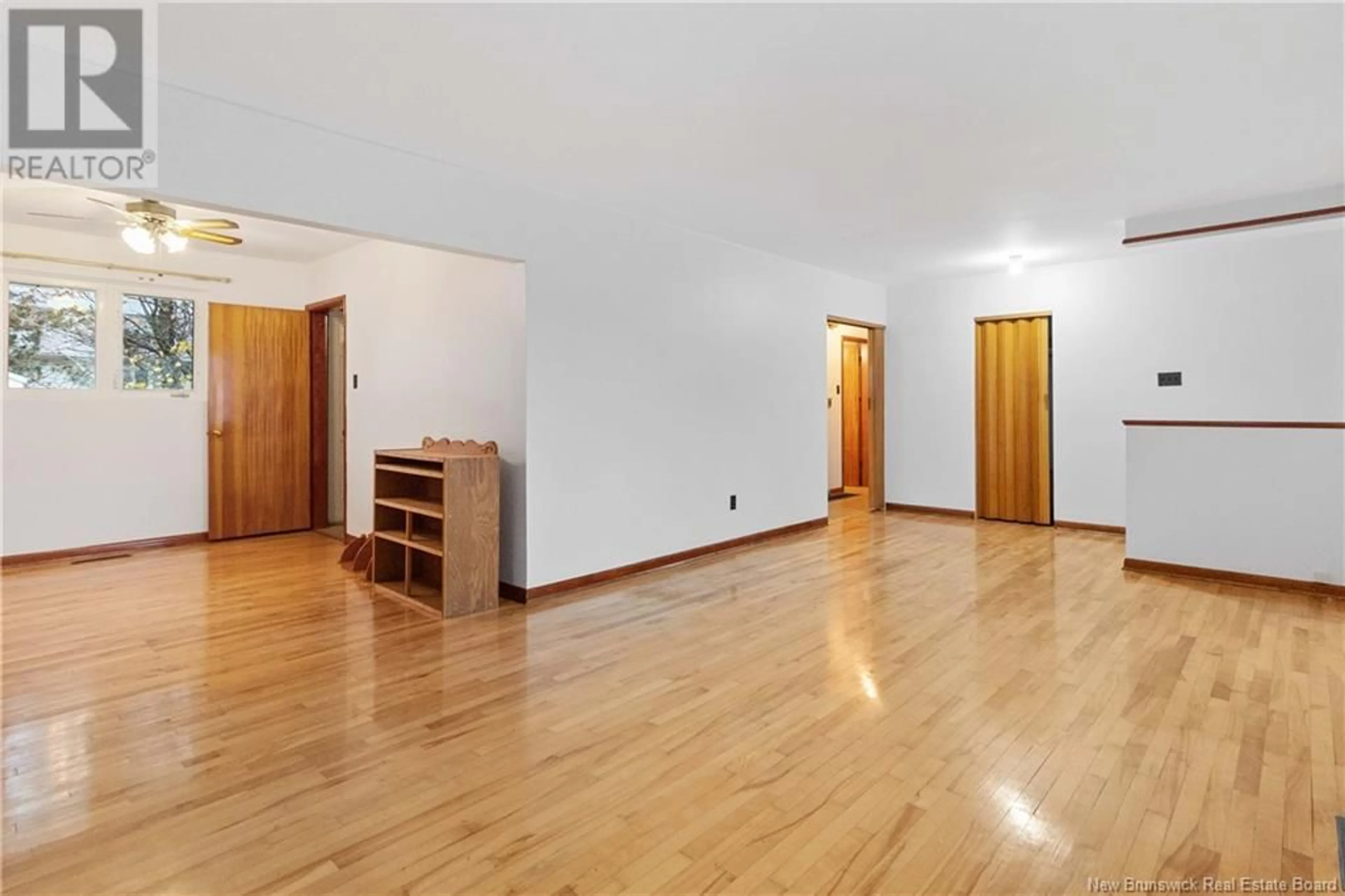 A pic of a room, wood floors for 55 Leeside Drive, Moncton New Brunswick E1C4L4