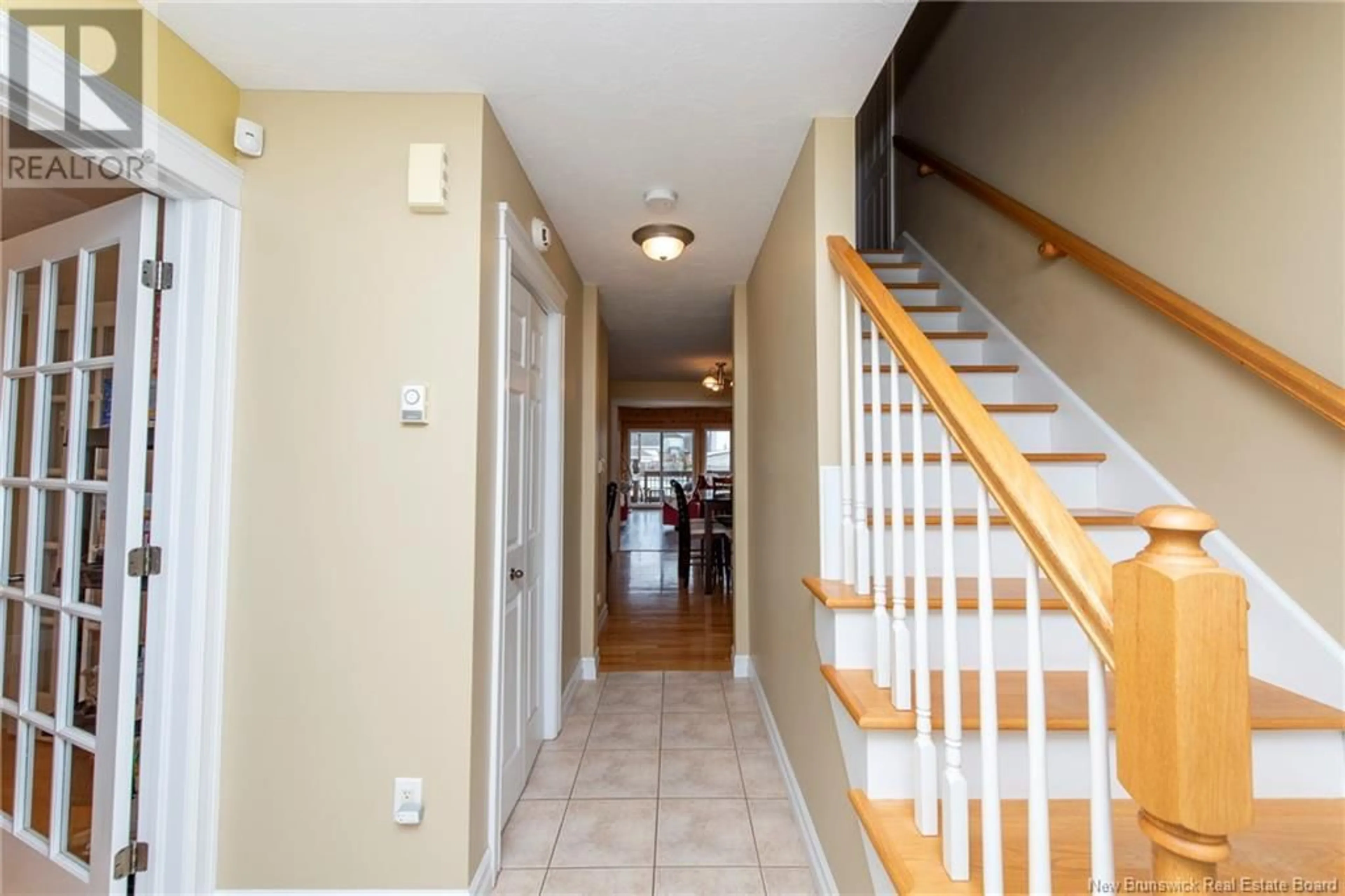 Indoor foyer, wood floors for 23 CAMELOT, Moncton New Brunswick E1A6N9