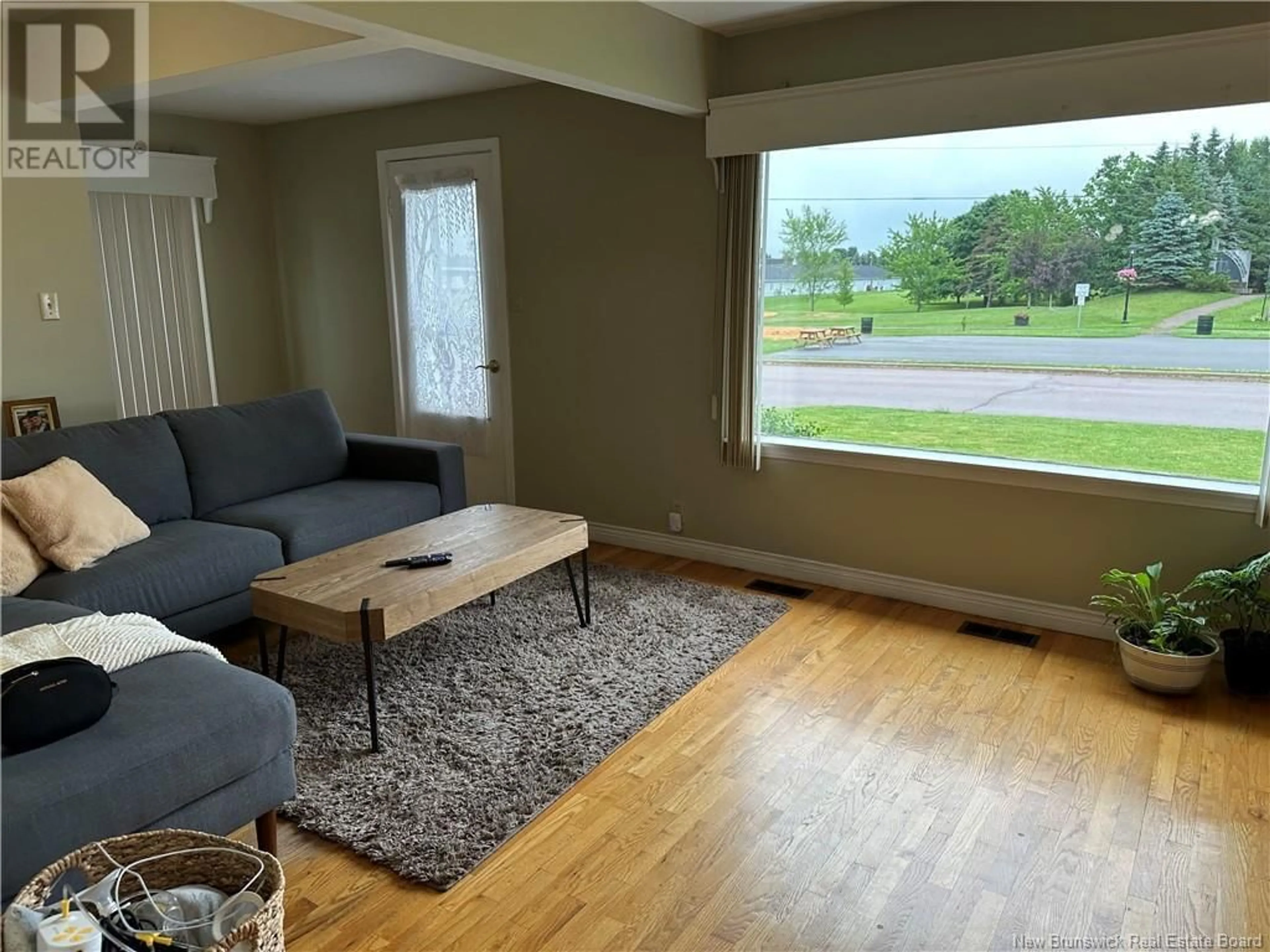 Living room, wood floors for 5 Edouard Avenue, Saint-Antoine New Brunswick E4V1G3