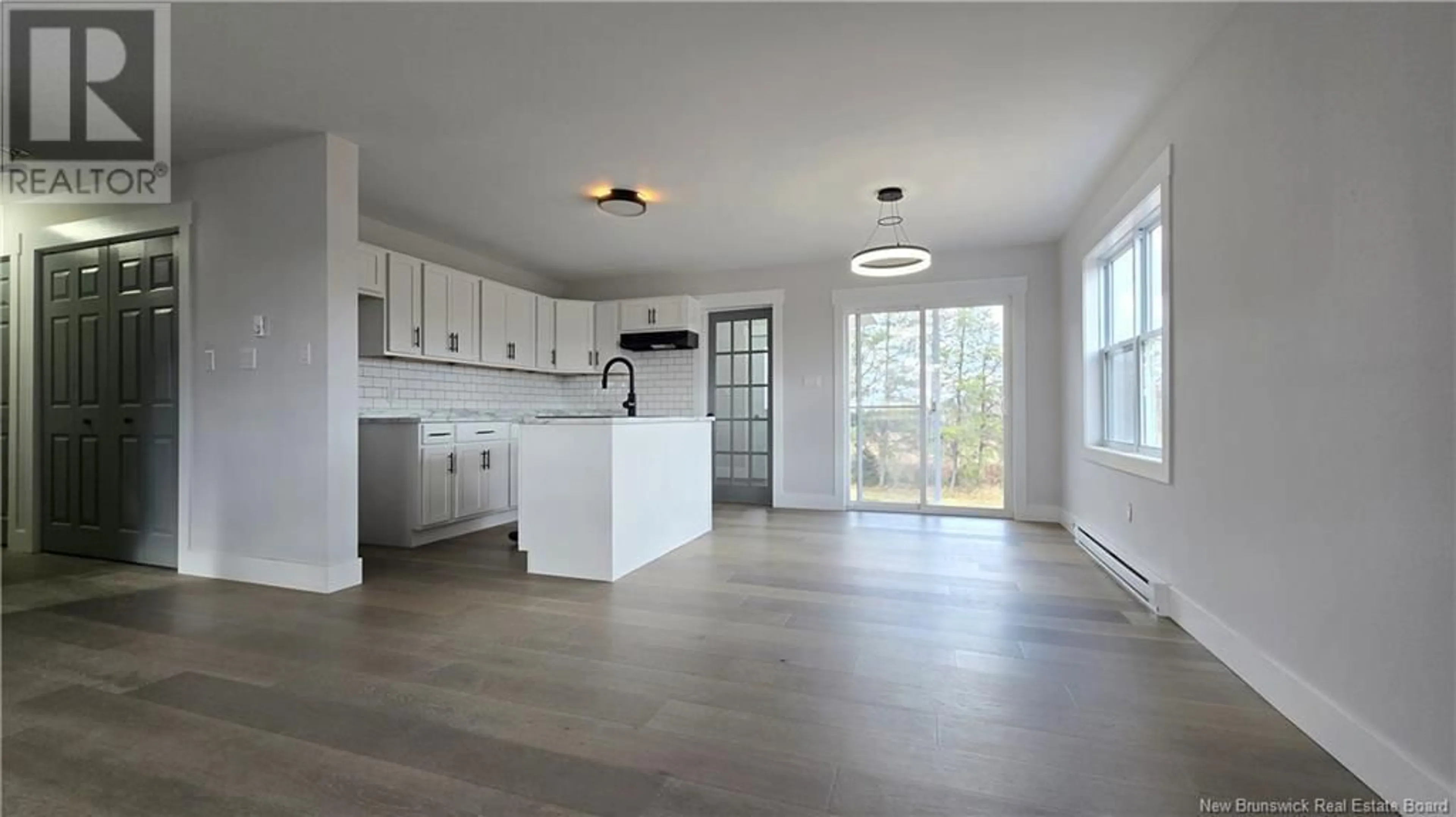 Open concept kitchen for 278 Nixon Road, Colpitts Settlement New Brunswick E4J3L5