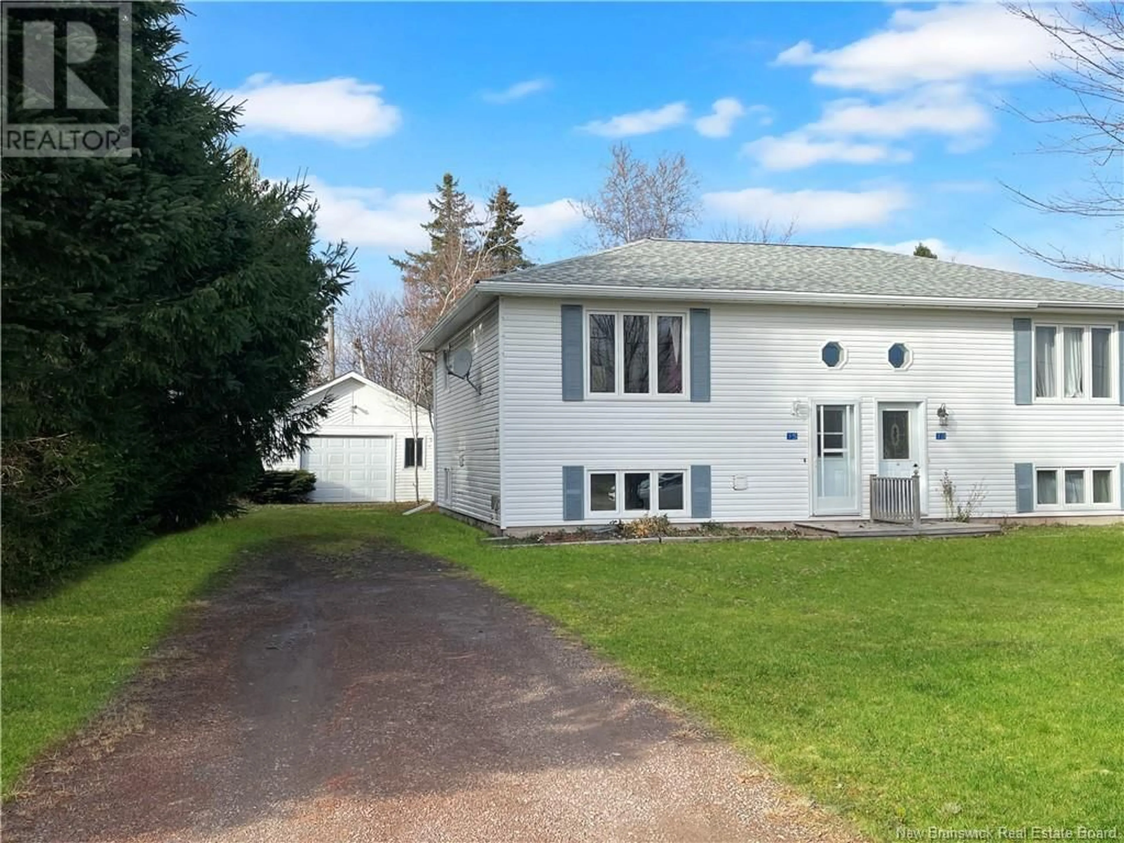 Frontside or backside of a home, the front or back of building for 15 Tiffany Avenue, Bouctouche New Brunswick E4S3X2