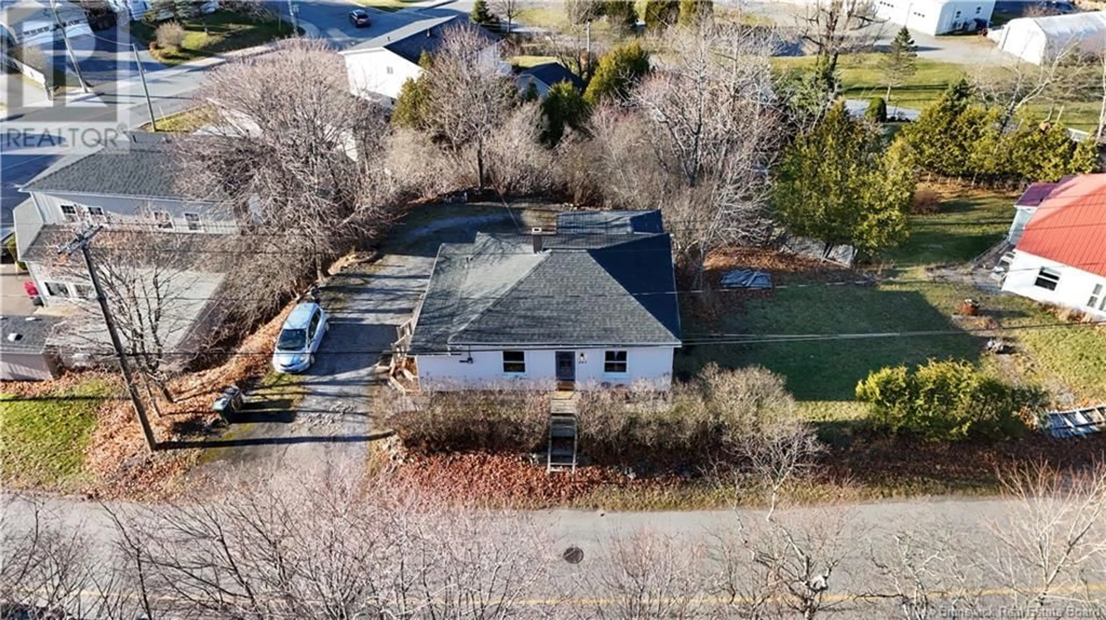 Frontside or backside of a home, the fenced backyard for 201 Hawthorne Avenue, Saint John New Brunswick E2K3R6