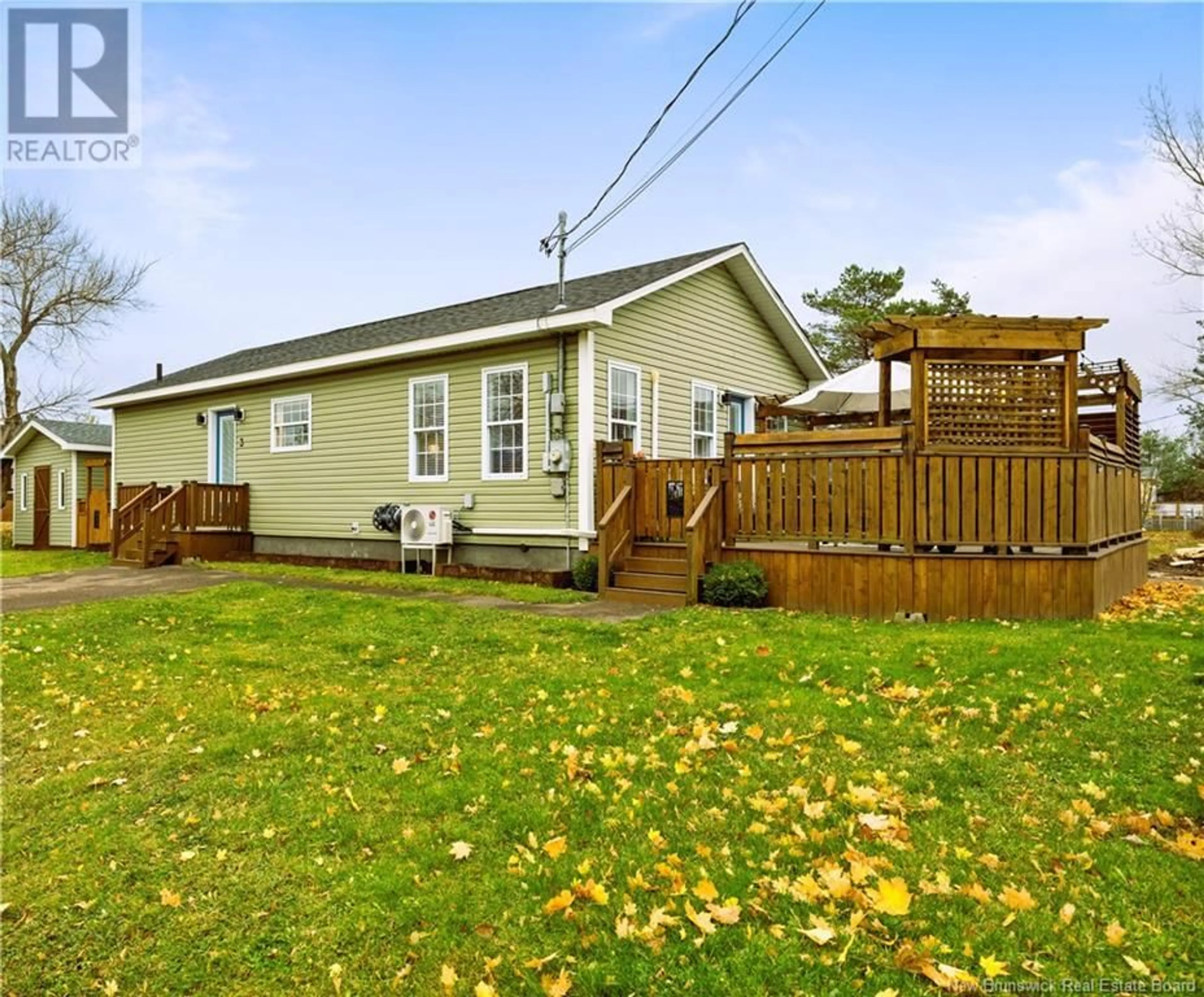 Frontside or backside of a home, the fenced backyard for 3 Brydges Street, Pointe-Du-Chêne New Brunswick E4P3X6