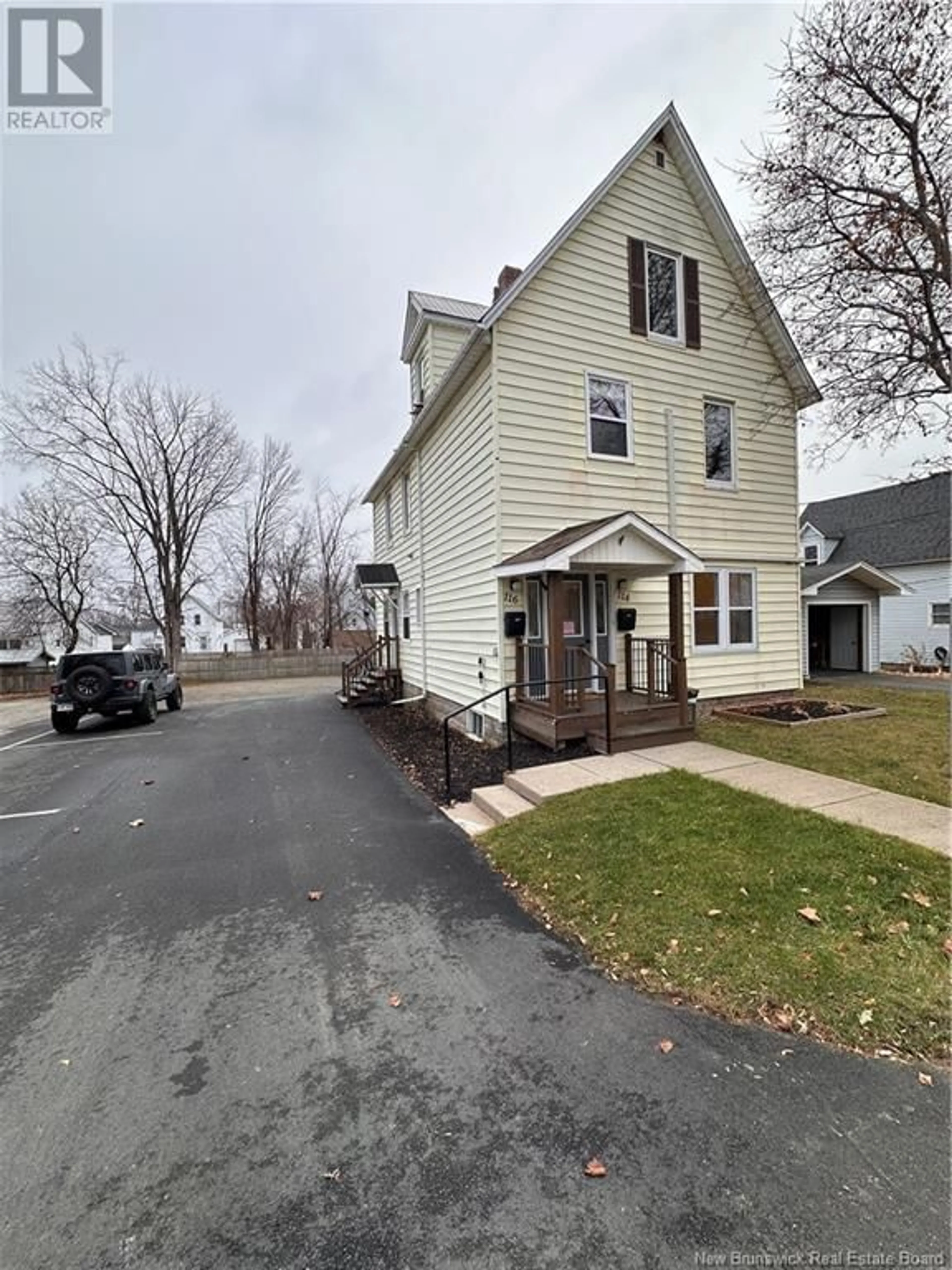 Frontside or backside of a home, the street view for 114 Pleasant, Miramichi New Brunswick E1V1X7