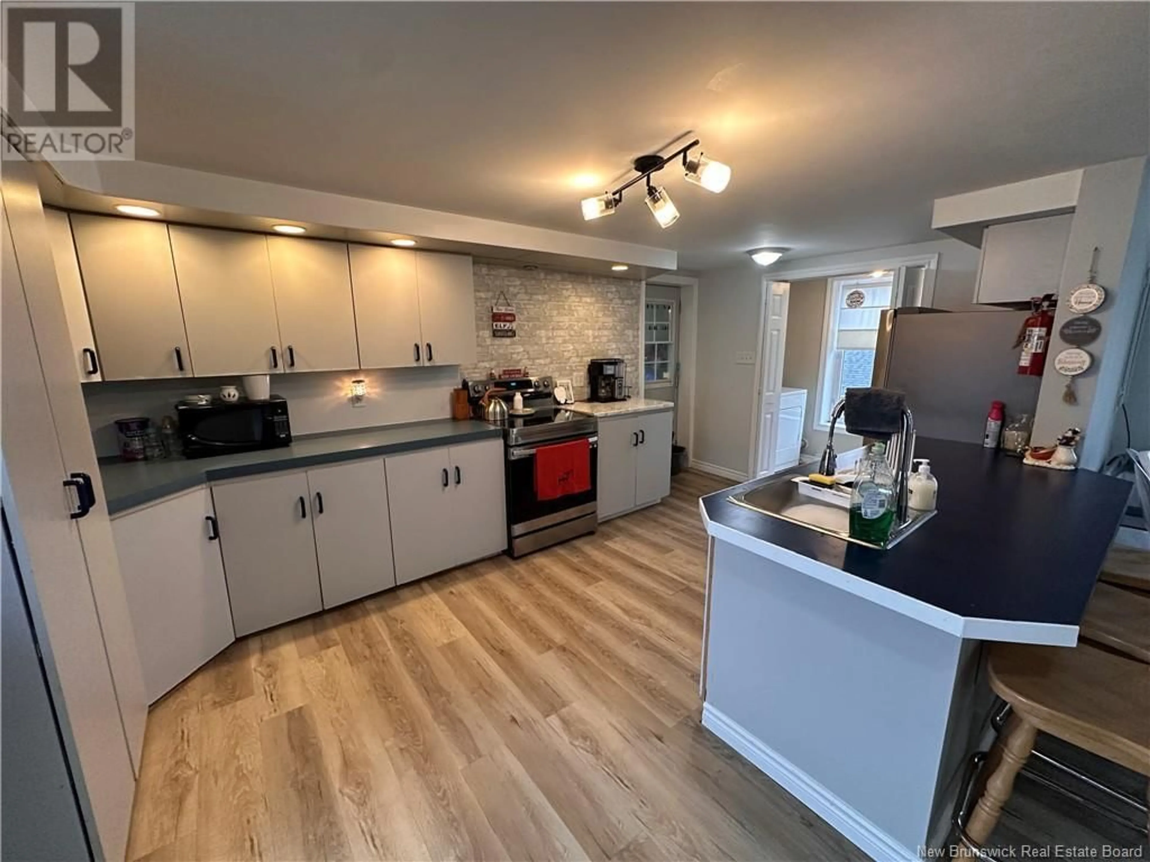 Open concept kitchen for 114 Pleasant, Miramichi New Brunswick E1V1X7