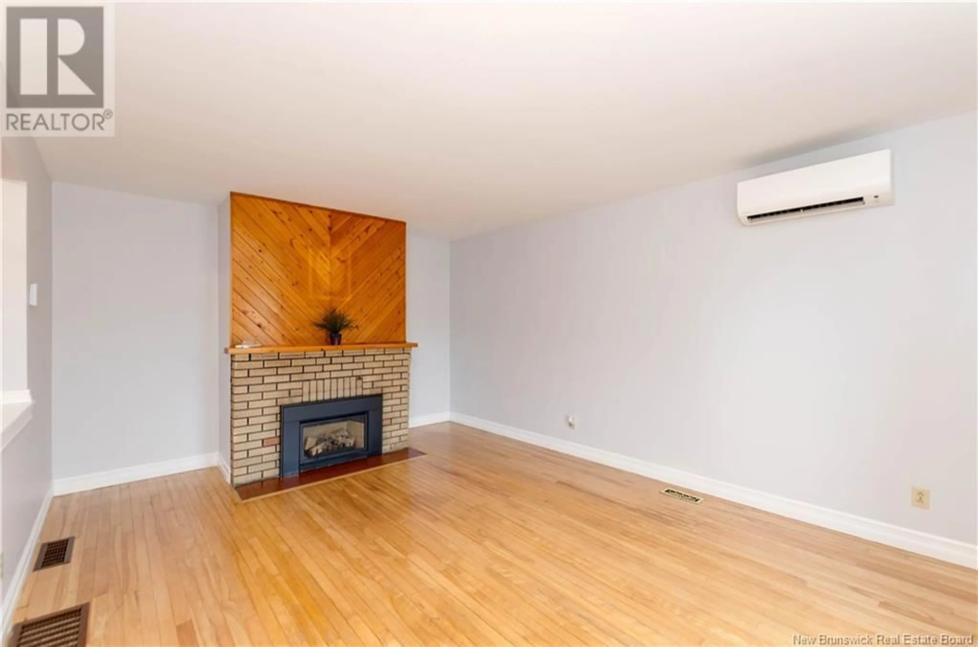 Living room, wood floors for 211 Humphrey Street, Moncton New Brunswick E1J1J3