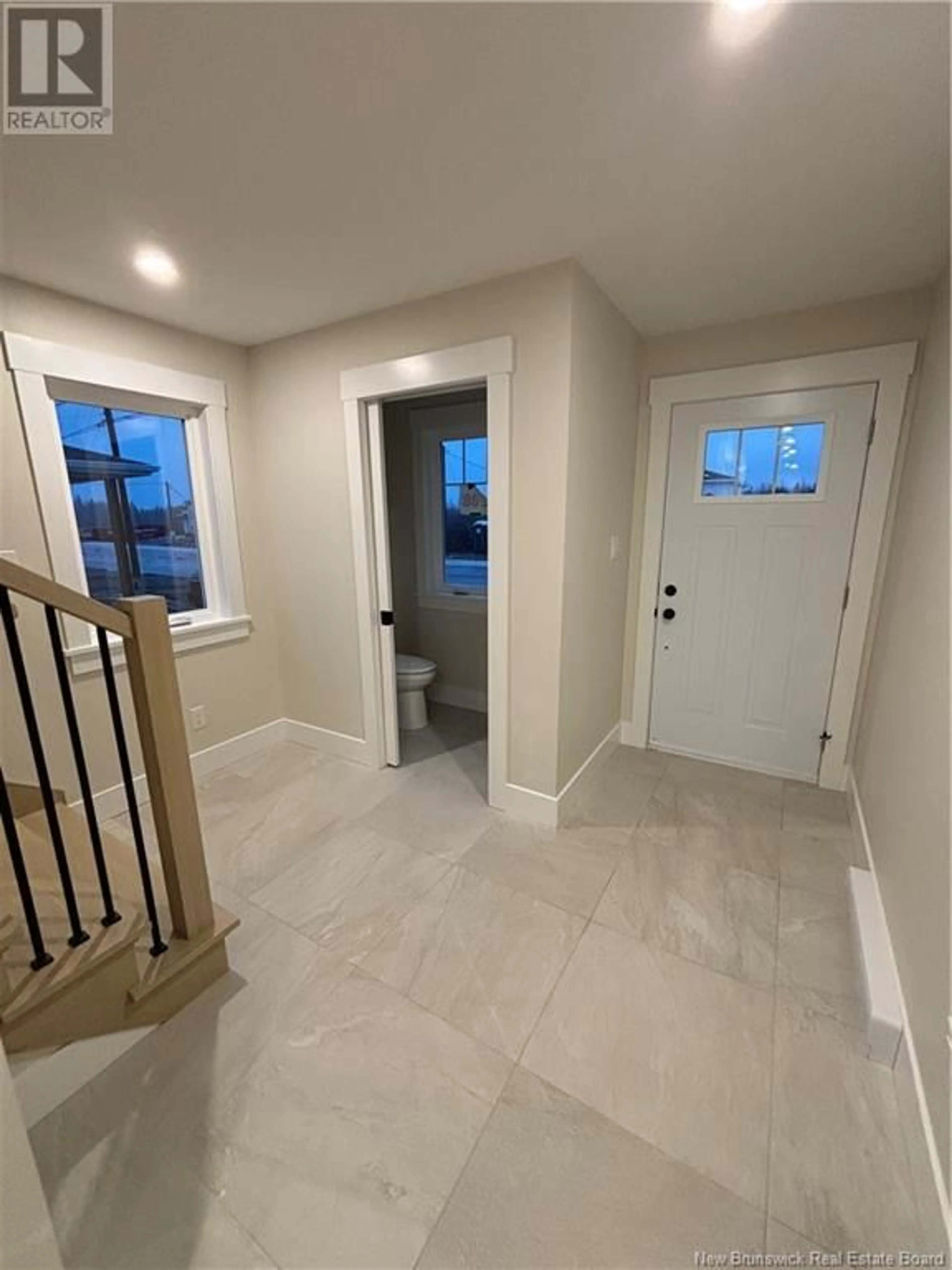 Indoor entryway, cement floor for 208 Cadieux Street, Moncton New Brunswick E1K0A1