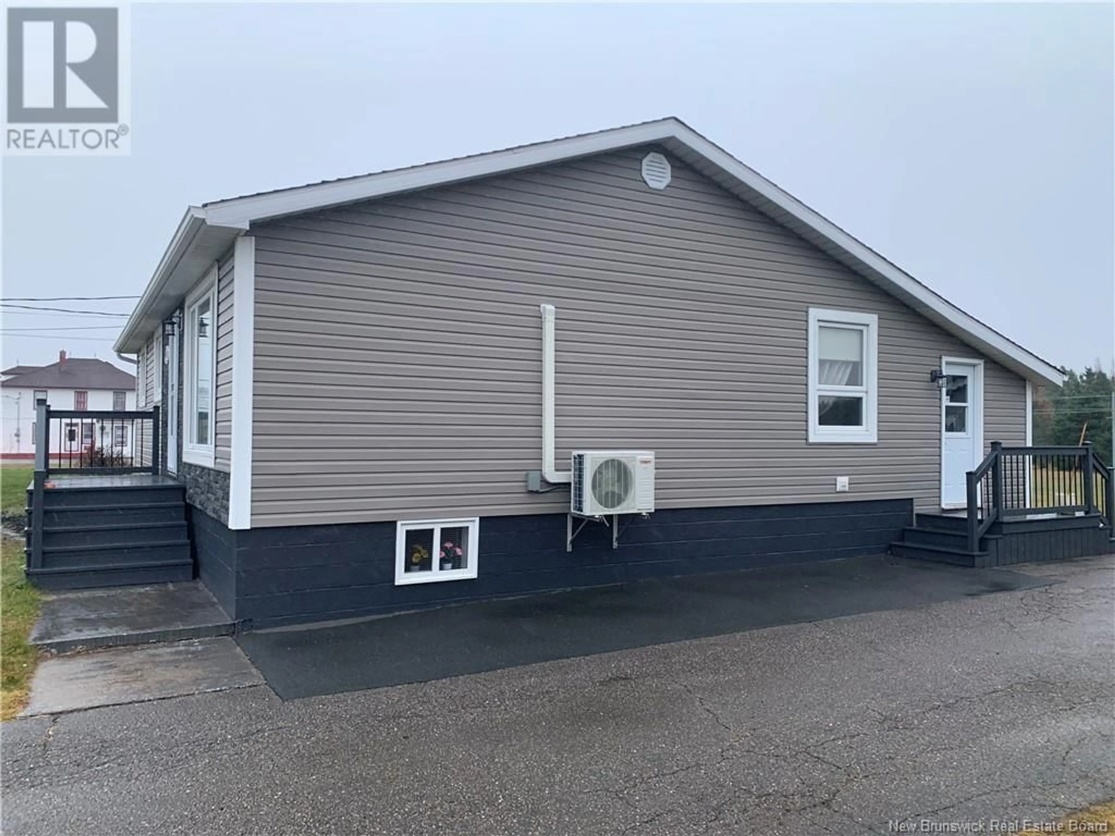 Home with vinyl exterior material for 11512 ROUTE 11, Pokemouche New Brunswick E8P1K2