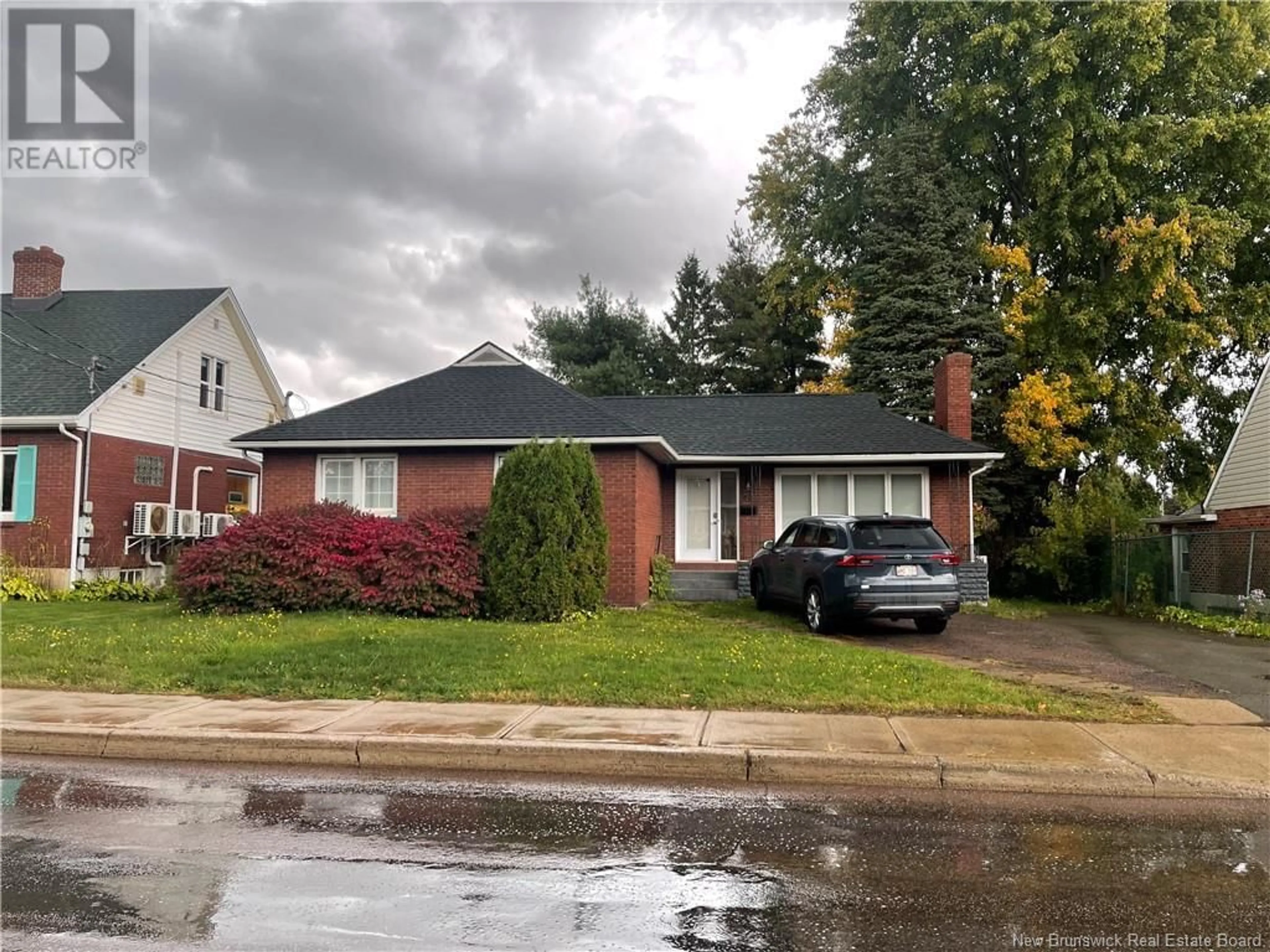 Home with brick exterior material, street for 65 Macbeath Avenue, Moncton New Brunswick E1C6Z2