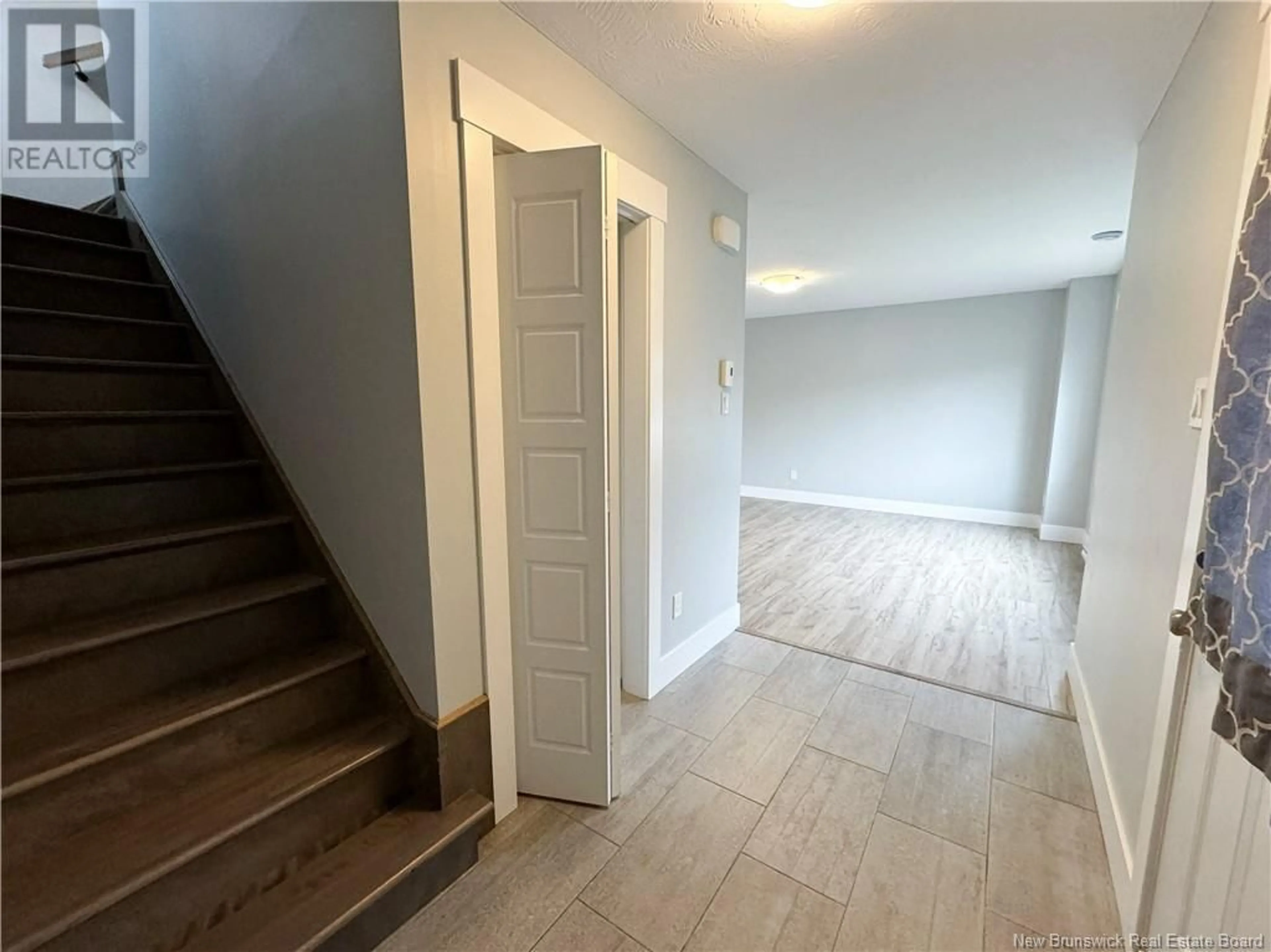 A pic of a room, wood floors for 56 Des Peupliers Street, Dieppe New Brunswick E1A9E1