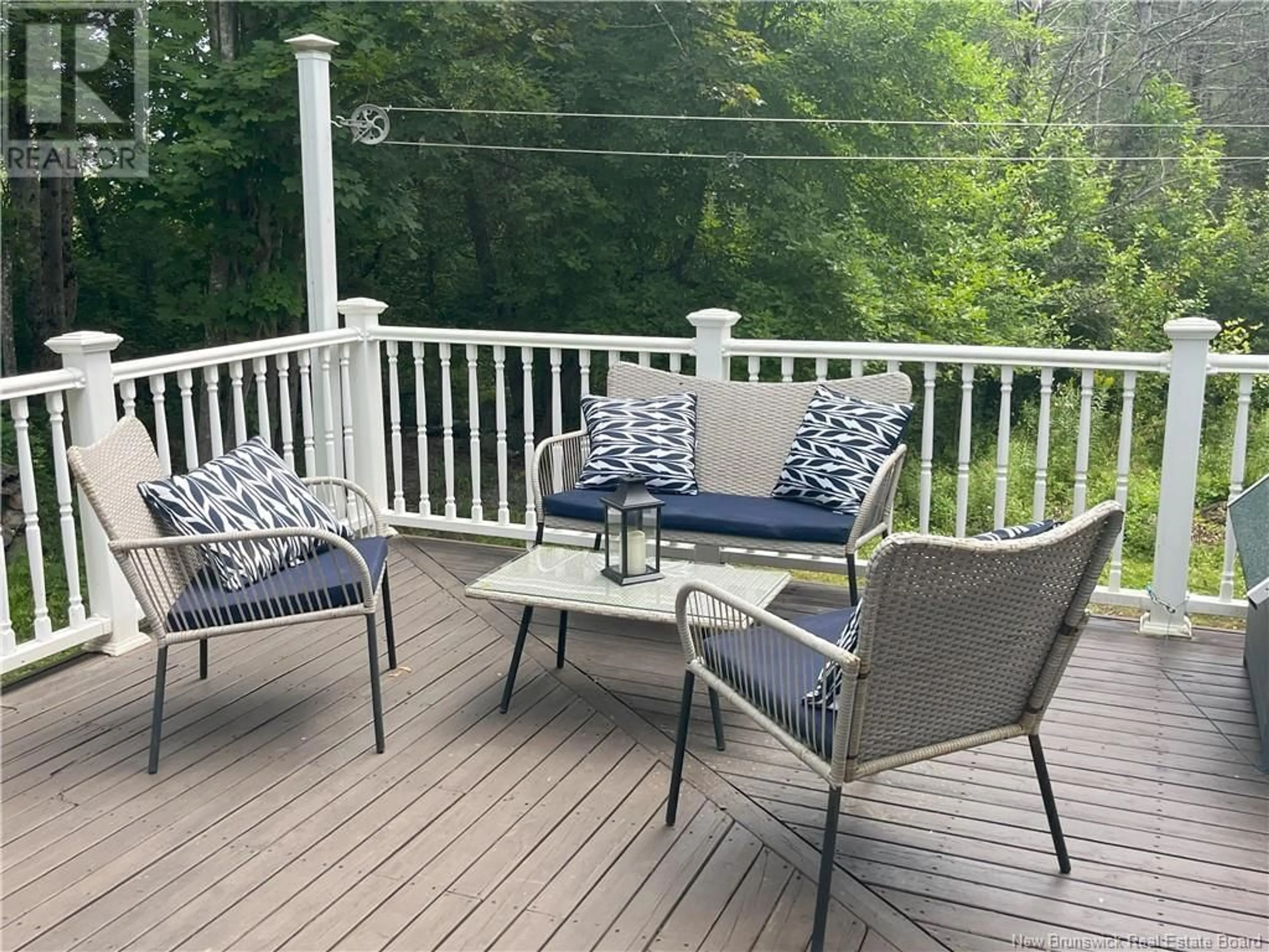 Patio, the fenced backyard for 29 Elm Street, St. Stephen New Brunswick E3L1S5