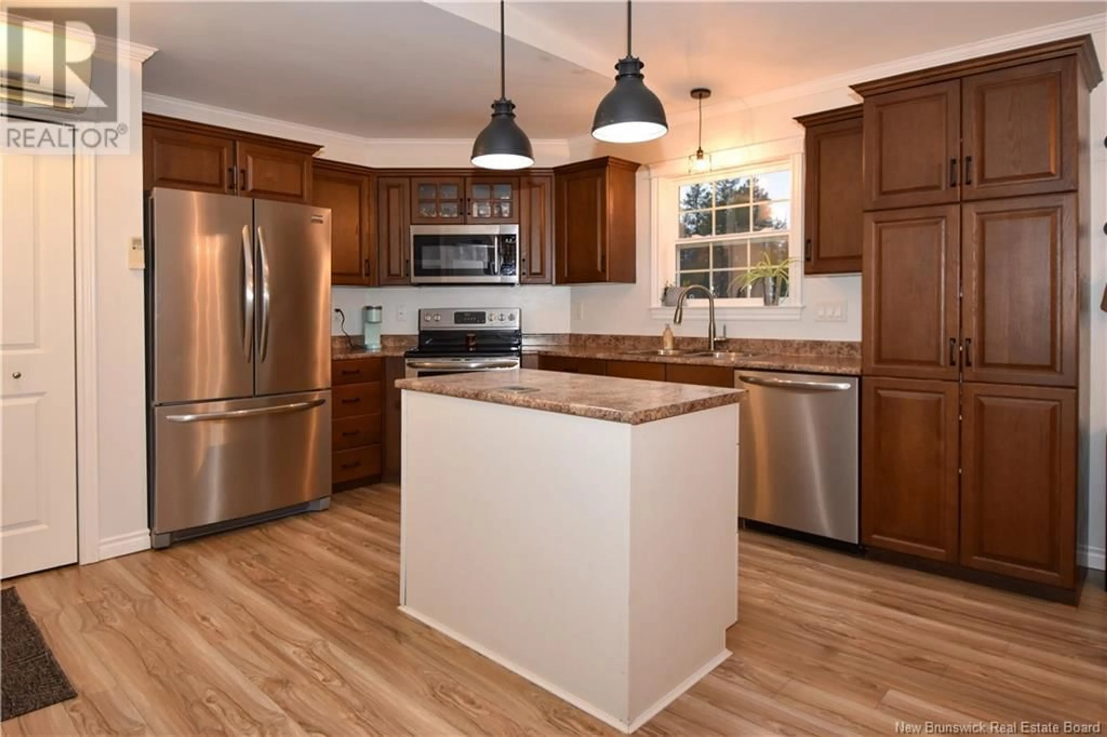 Open concept kitchen for 24 Norman, Pointe-À-Tom New Brunswick E1X3W8