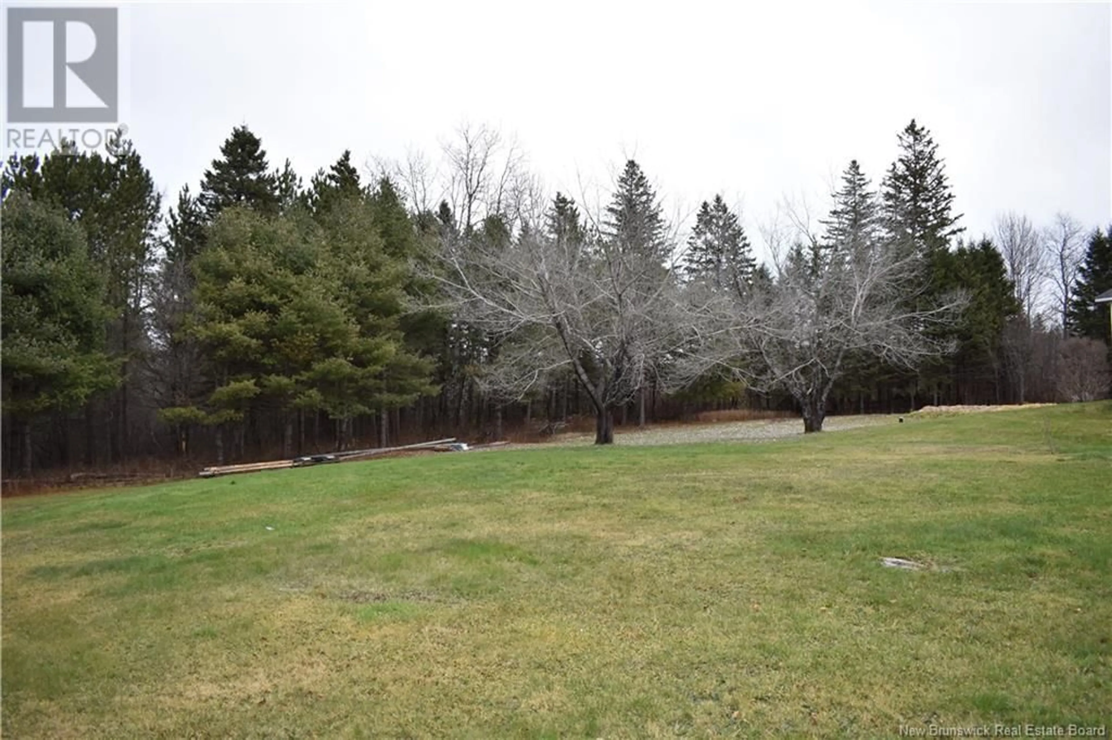 A pic from outside/outdoor area/front of a property/back of a property/a pic from drone, forest/trees view for 1122 ROUTE 580, Glassville New Brunswick E7L1P8