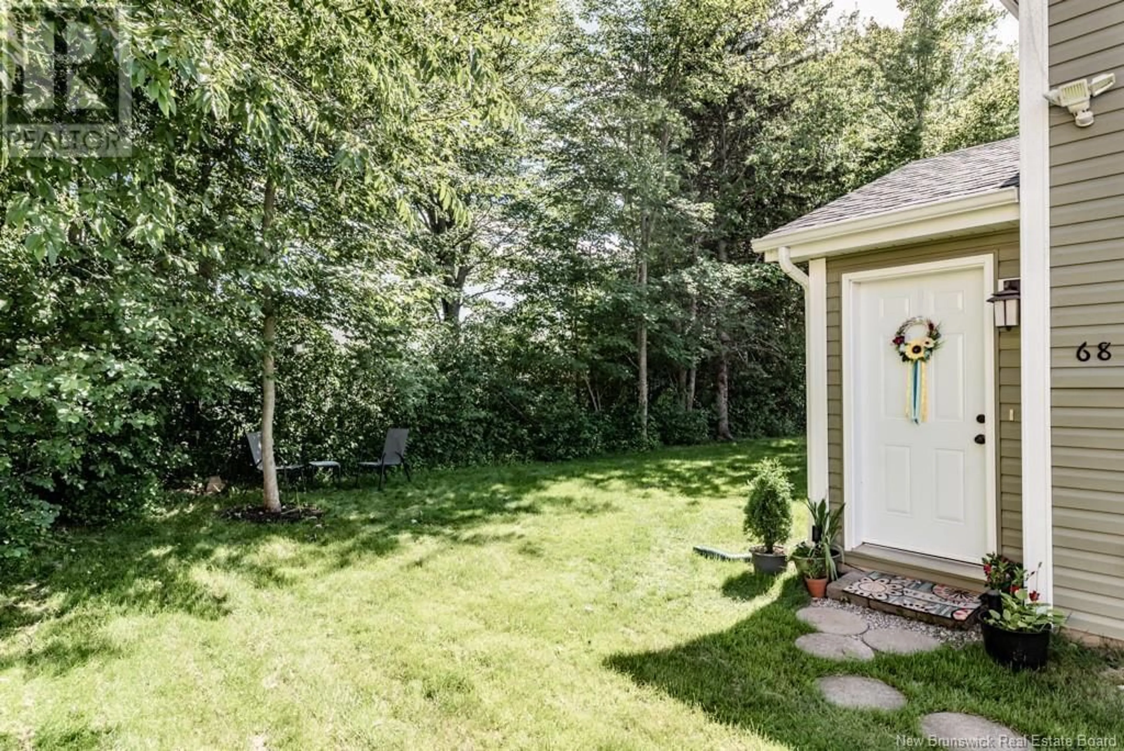 Patio, the fenced backyard for 70 Herman Street, Dieppe New Brunswick E1A0L5